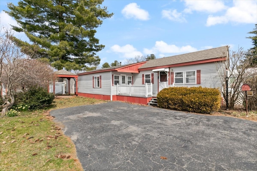 5 E Street Merrimac, MA 01860 - Photo 3 of 25 a view of a house with a yard and fence