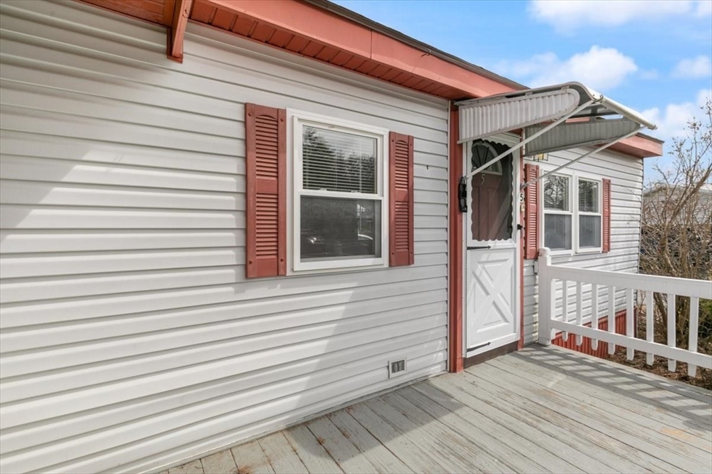 5 E Street Merrimac, MA 01860 - Photo 5 of 25 a view of a house with a deck