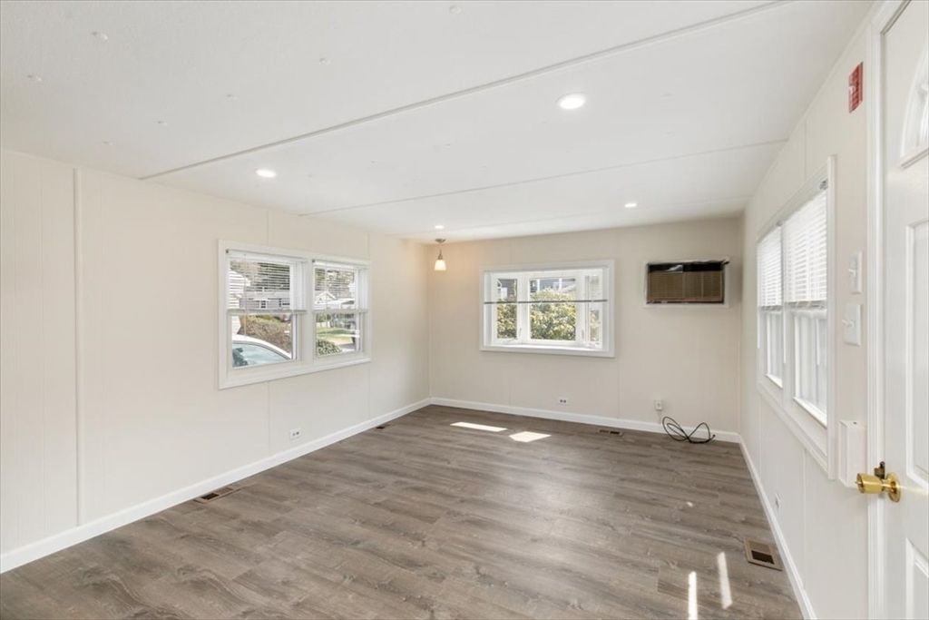 5 E Street Merrimac, MA 01860 - Photo 9 of 25 wooden floor in an empty room with a window