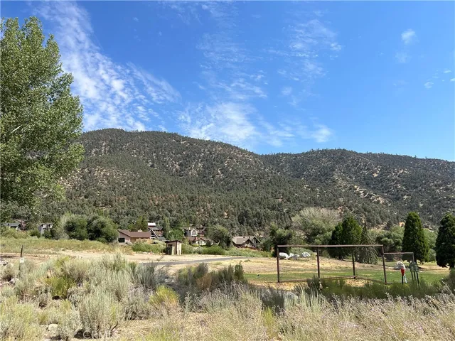 a view of a lake with mountains in the background