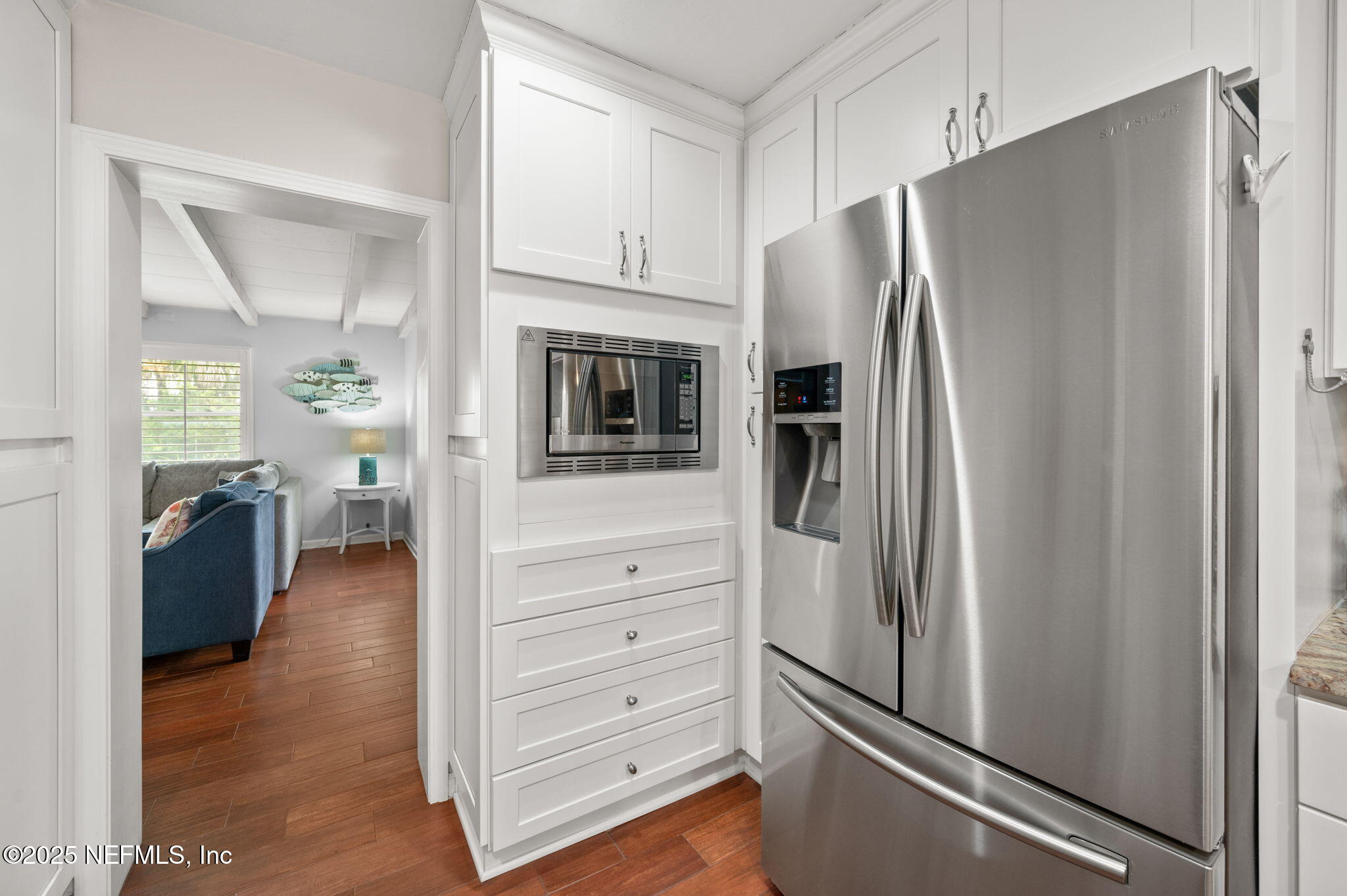 5454 2nd Street St. Augustine, FL 32080 - Photo 16 of 58 a kitchen with stainless steel appliances a refrigerator and cabinets