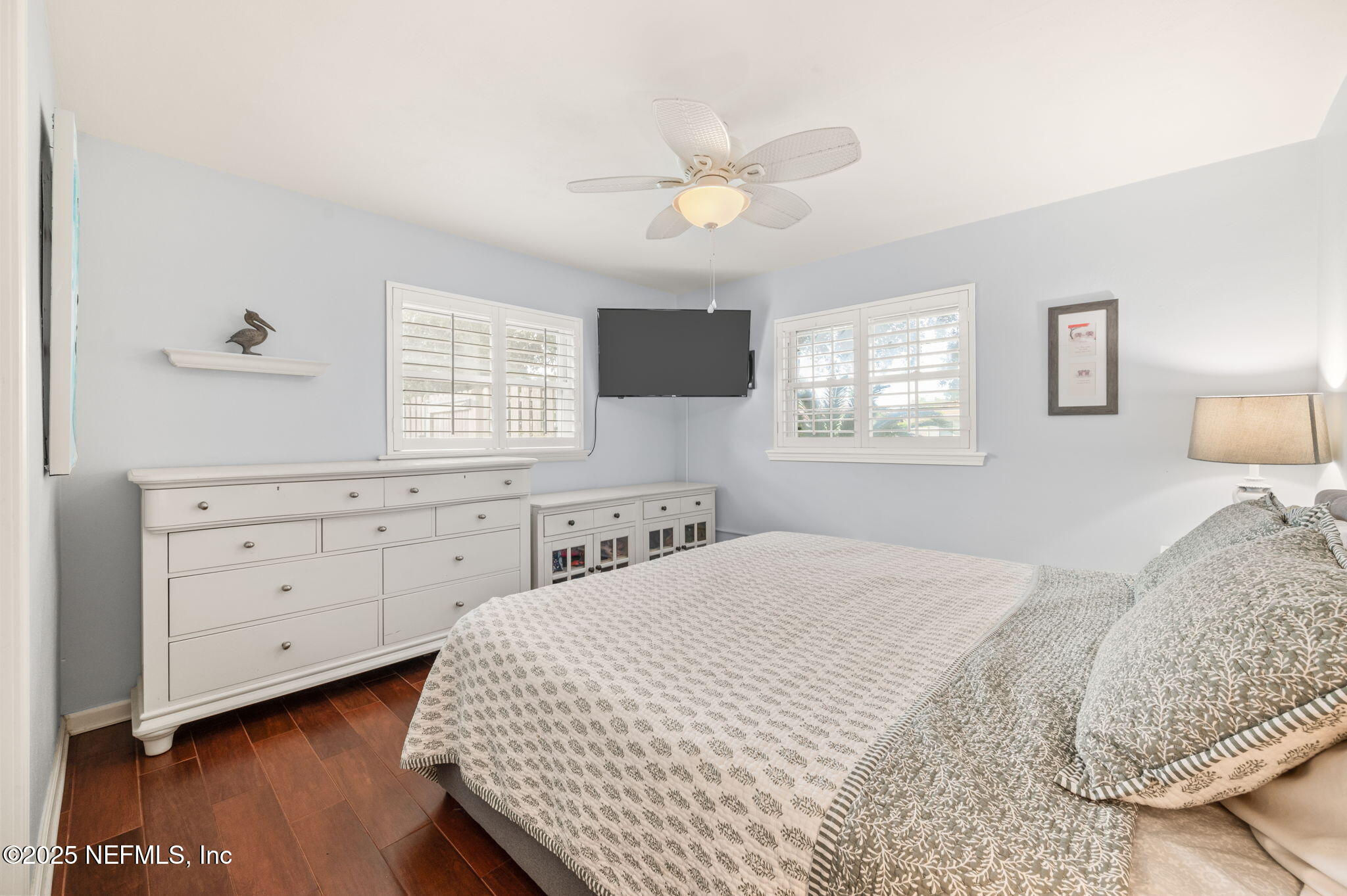 5454 2nd Street St. Augustine, FL 32080 - Photo 21 of 58 a bedroom with a bed and a window