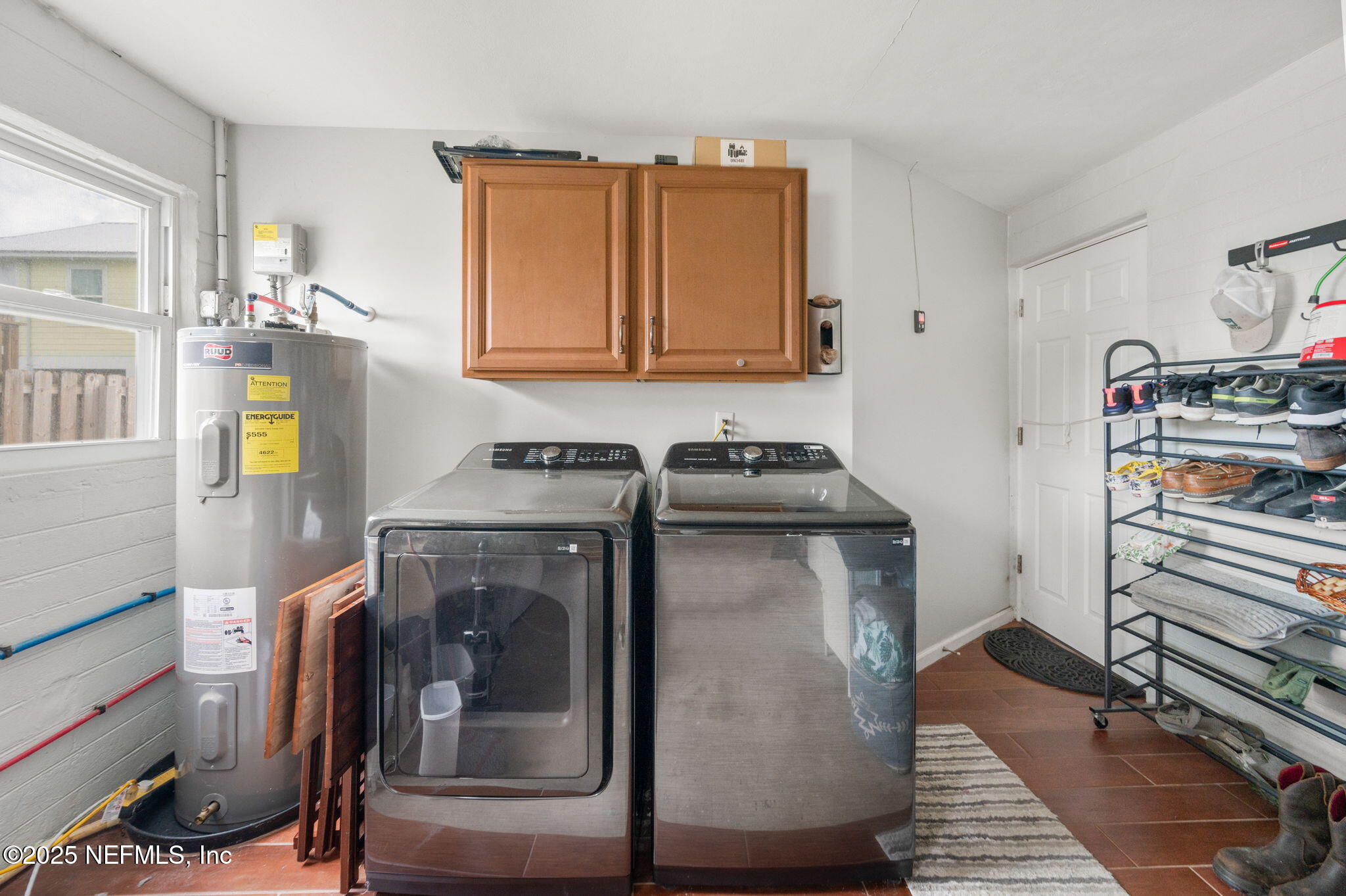 5454 2nd Street St. Augustine, FL 32080 - Photo 34 of 58 a kitchen with a stove and a cabinet