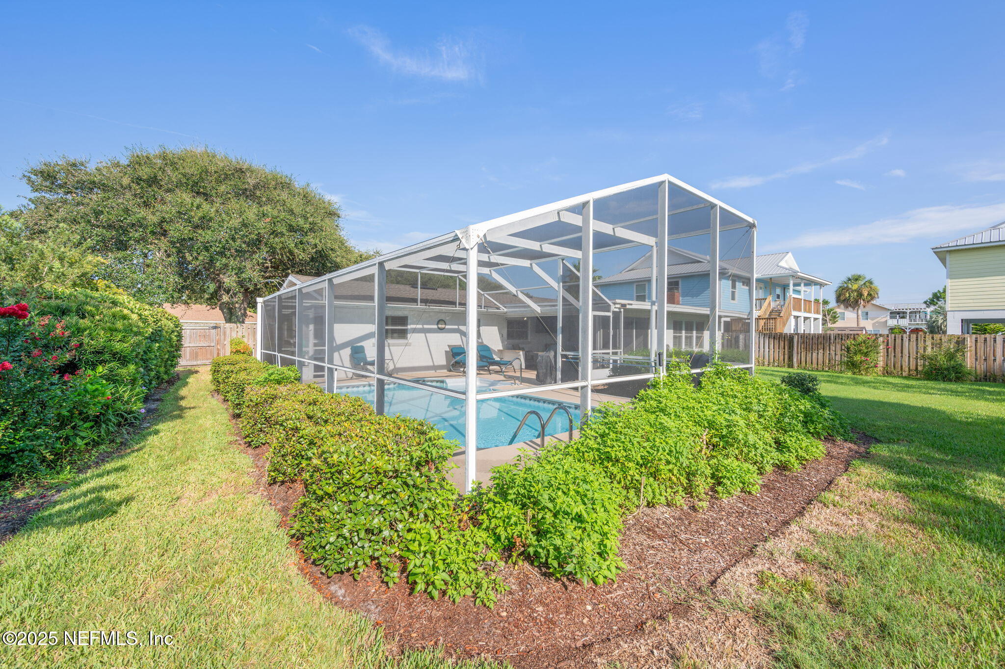 5454 2nd Street St. Augustine, FL 32080 - Photo 45 of 58 a front view of a house with a yard