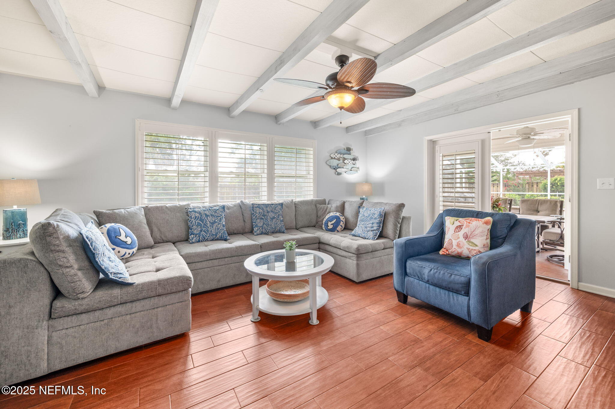 5454 2nd Street St. Augustine, FL 32080 - Photo 5 of 58 a living room with furniture and a large window