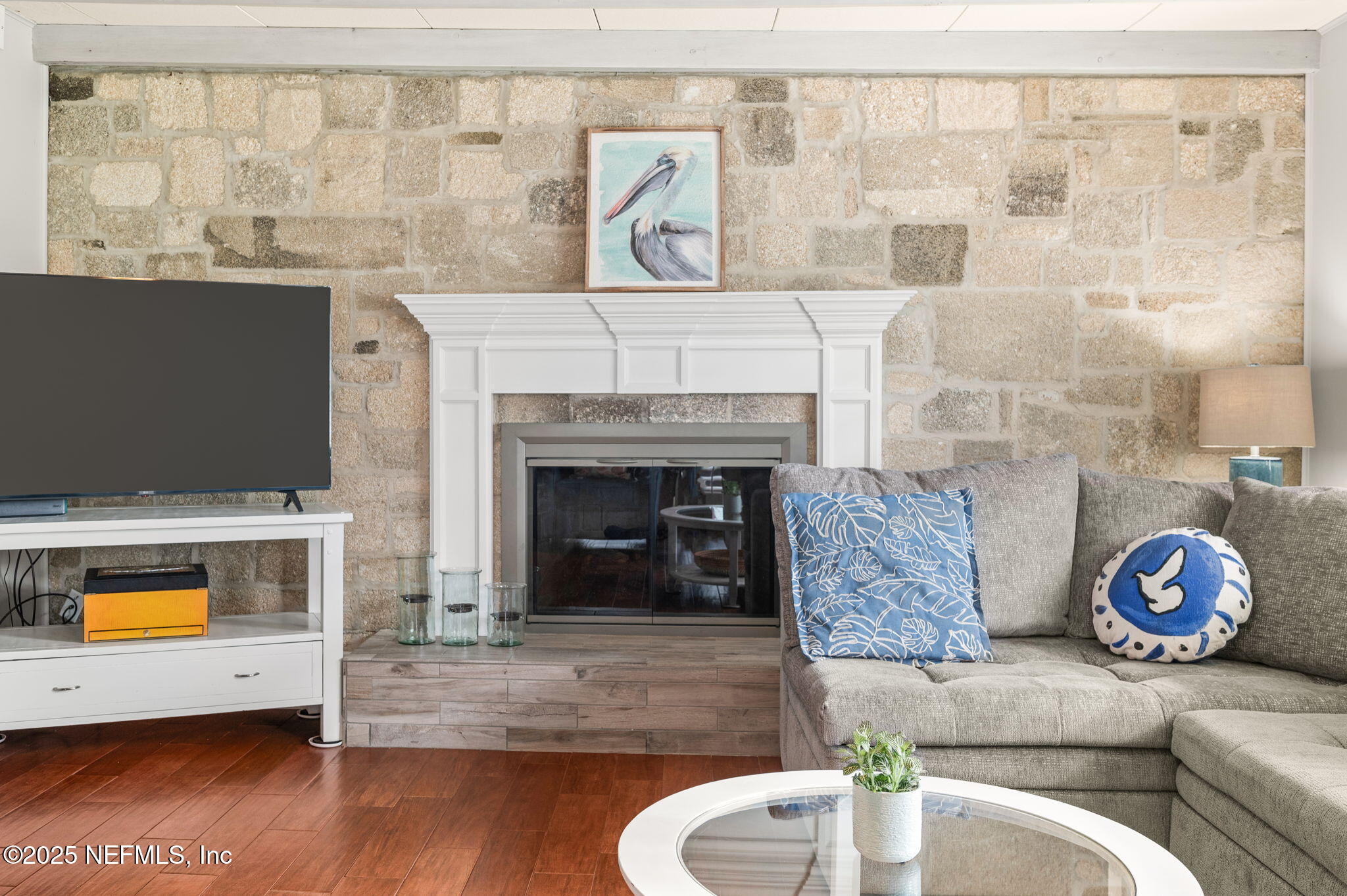 5454 2nd Street St. Augustine, FL 32080 - Photo 6 of 58 a living room with furniture and a fireplace