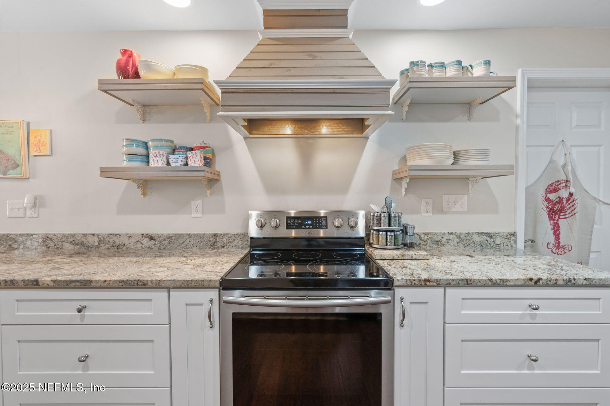 5454 2nd Street St. Augustine, FL 32080 - Photo 9 of 58 a stove top oven sitting inside of a kitchen