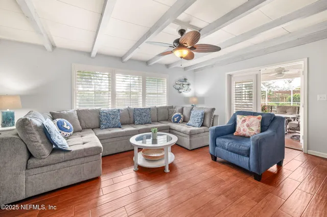 a bathroom with a toilet sink and a window