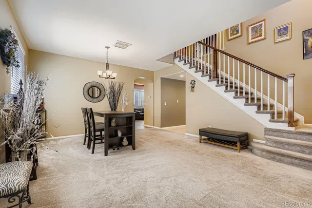 a view of a dining room with furniture