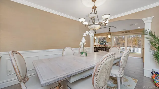 a view of a dining room with furniture