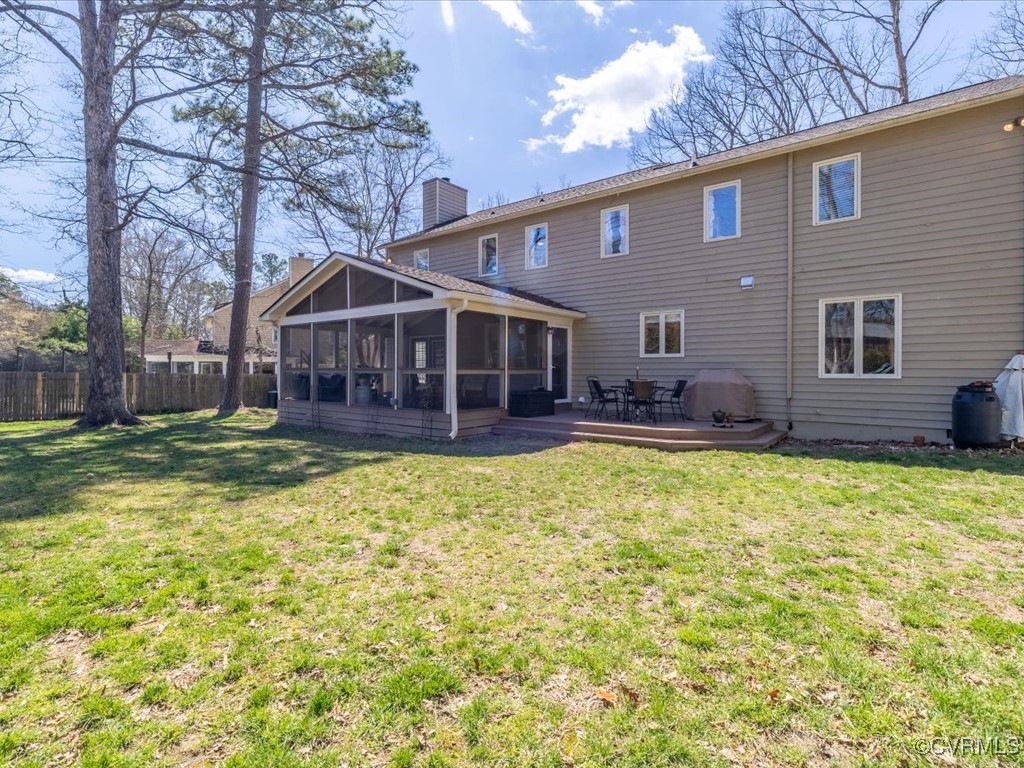 10603 Dover Pointe Road North Henrico, VA 23238 - Photo 36 of 49 Rear view of property with a sunroom, fence, a chi
