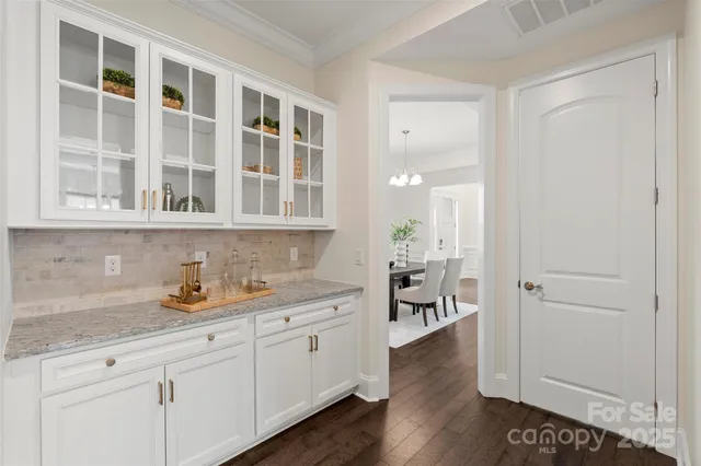 a hallway with cabinets