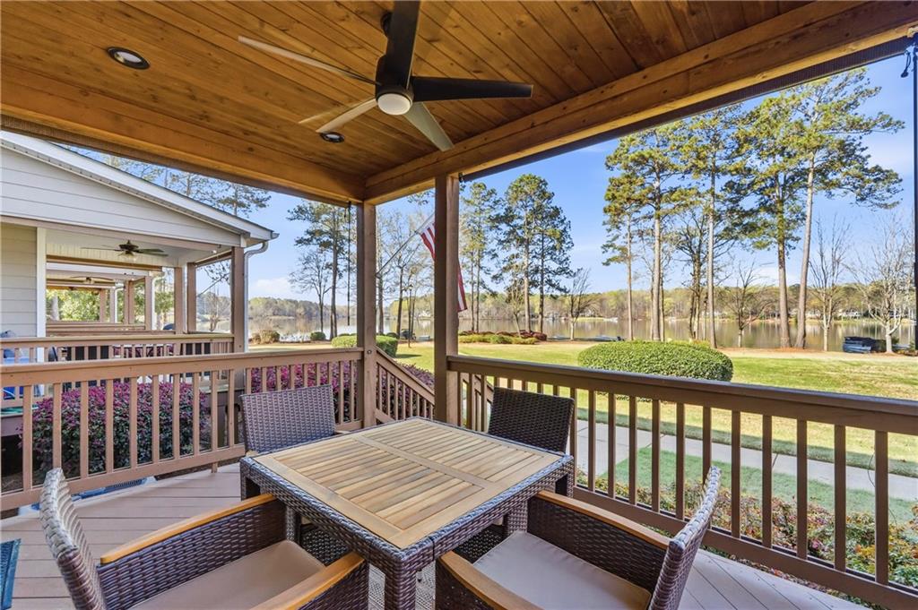 549 Old Phoenix Road Northeast, Unit 104 Eatonton, GA 31024 - Photo 21 of 48 a view of a patio with wooden floor