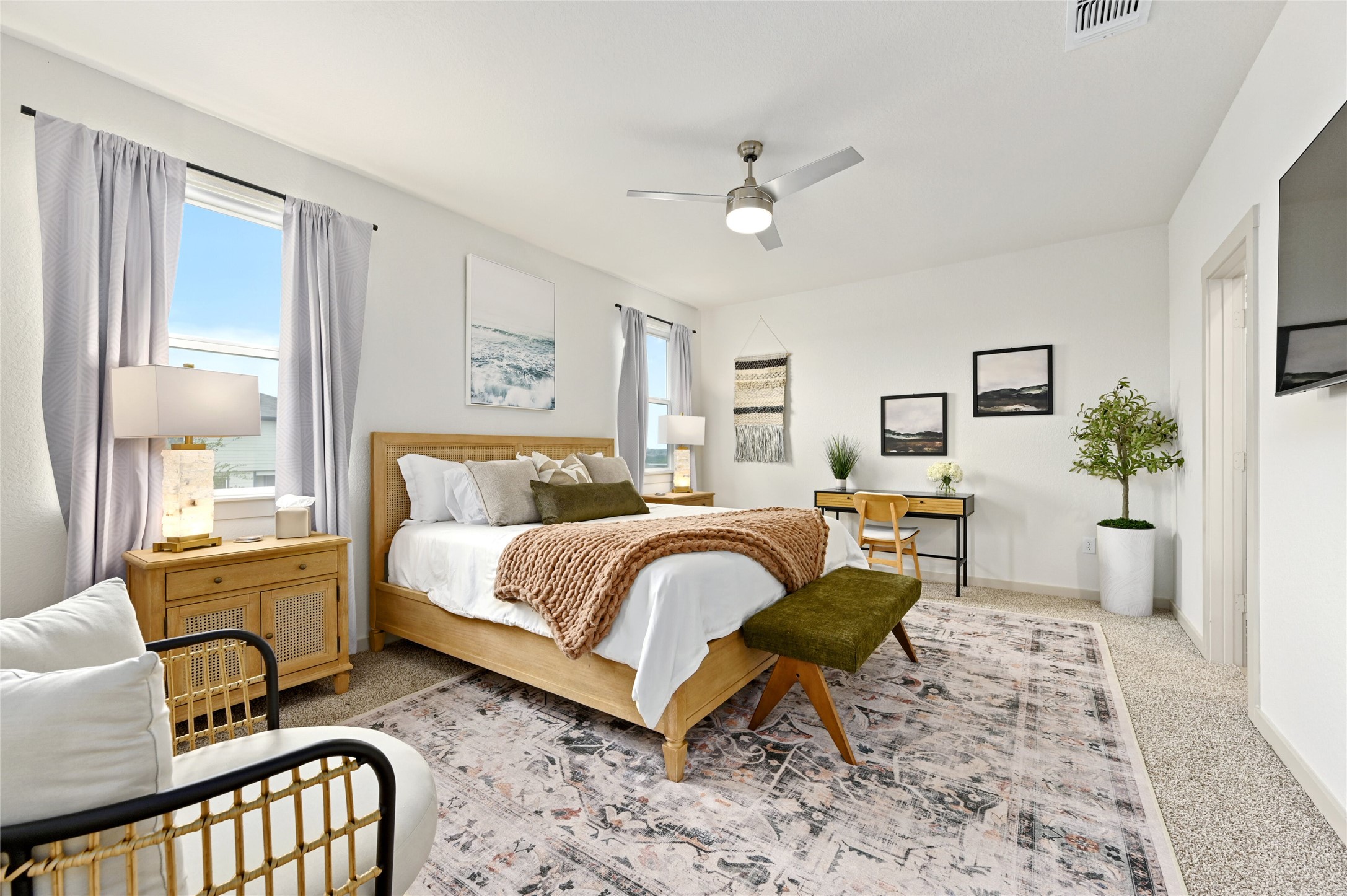 2300 Ranier Court Austin, TX 78754 - Photo 11 of 24 Bedroom featuring multiple windows and ceiling fan