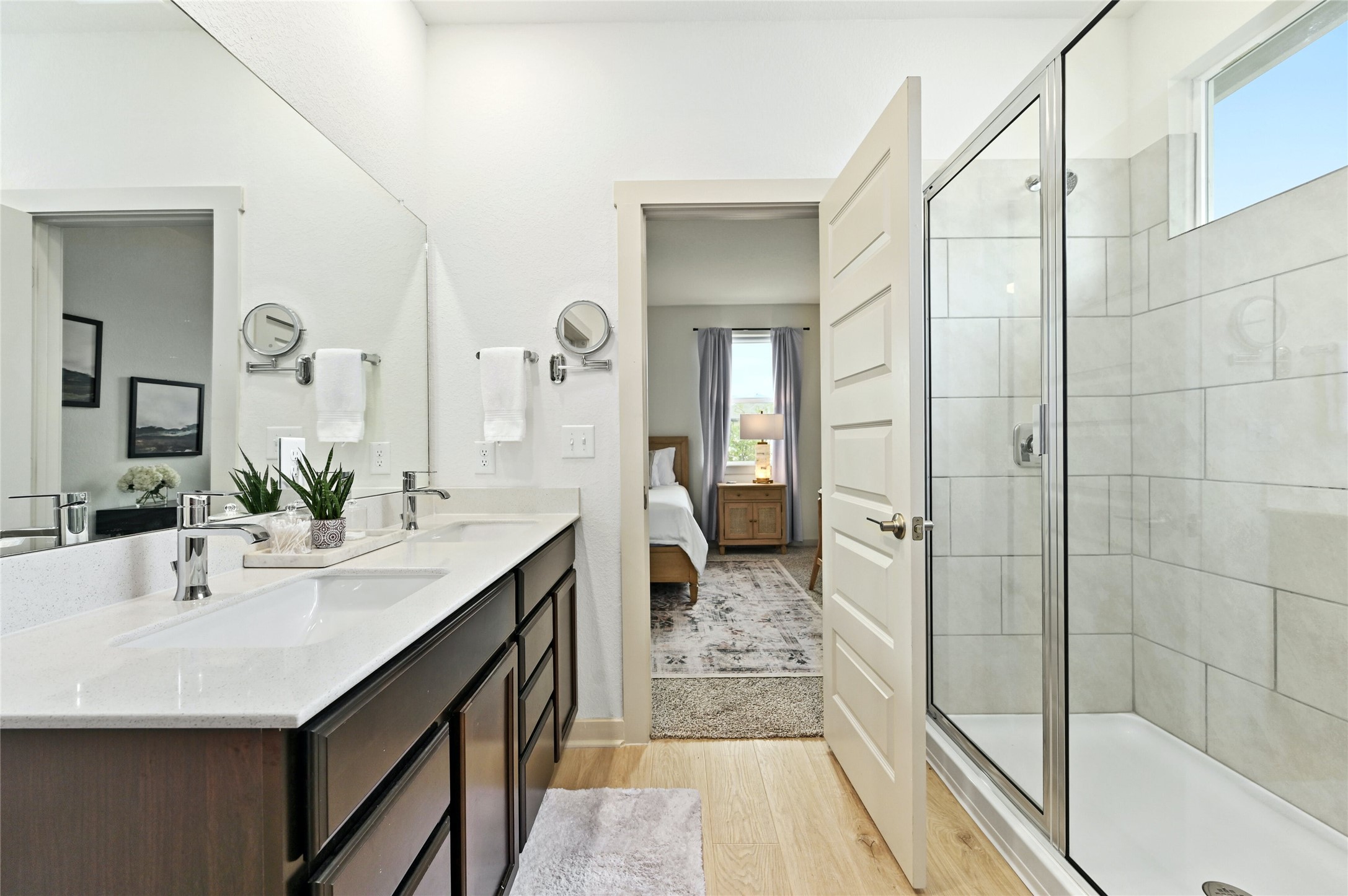 2300 Ranier Court Austin, TX 78754 - Photo 13 of 24 Full bath featuring ensuite bathroom, healthy amount of natural light, and a stall shower