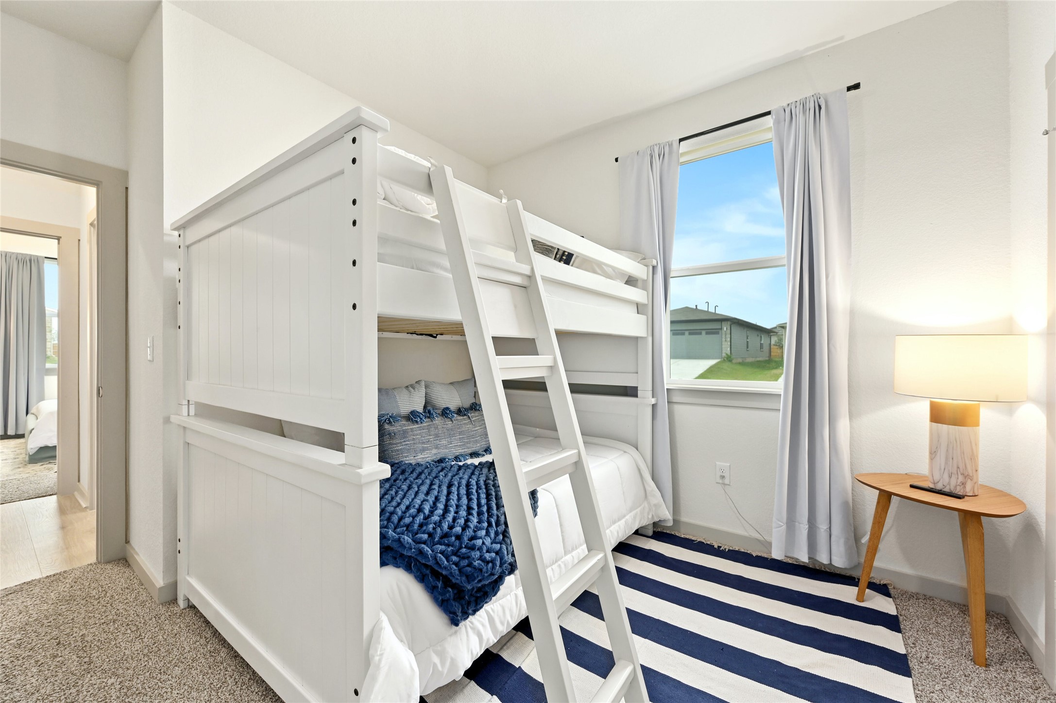 2300 Ranier Court Austin, TX 78754 - Photo 18 of 24 Bedroom with light colored carpet