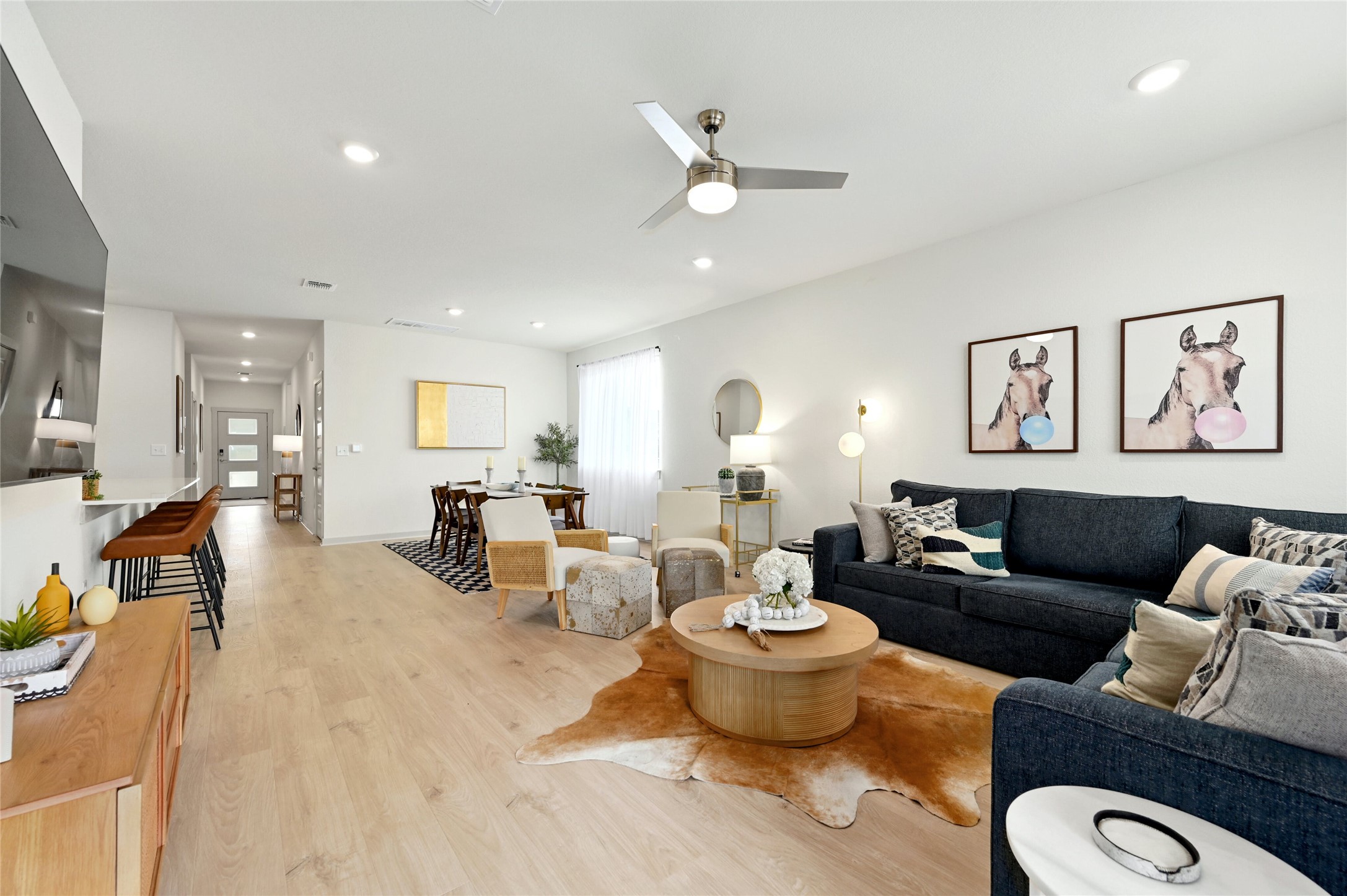 2300 Ranier Court Austin, TX 78754 - Photo 6 of 24 Living area with light wood-style flooring, a ceiling fan, and recessed lighting