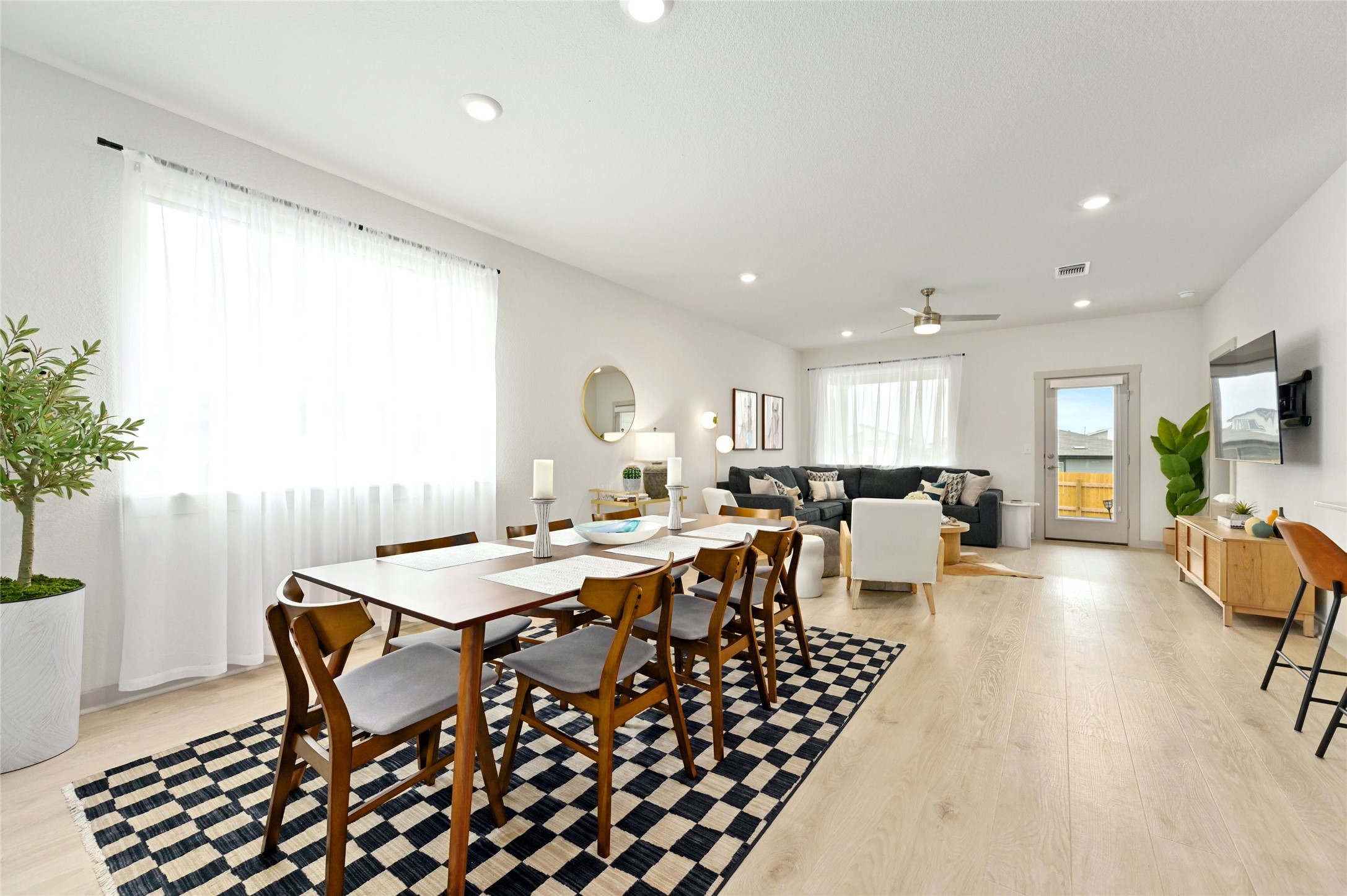 2300 Ranier Court Austin, TX 78754 - Photo 7 of 24 Dining space featuring light wood finished floors, recessed lighting, and ceiling fan