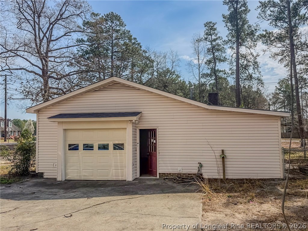 575 Veterans Road St. Pauls, NC 28384 - Photo 23 of 27 a front view of a house with a yard