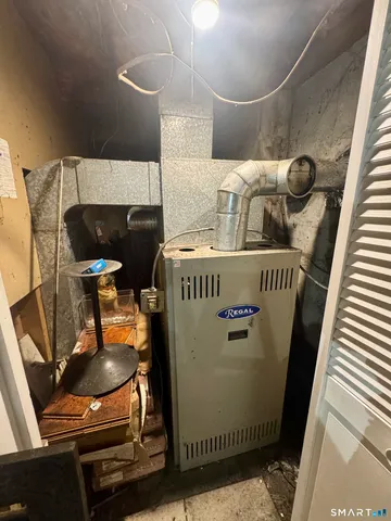 a bathroom with a sink toilet and mirror