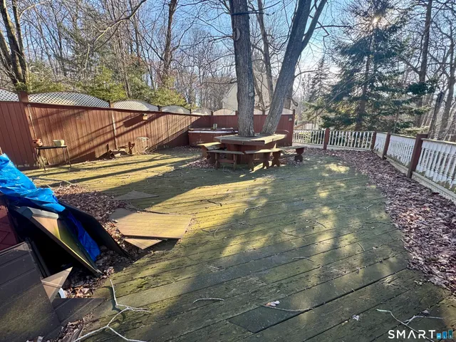 a view of backyard with outdoor seating