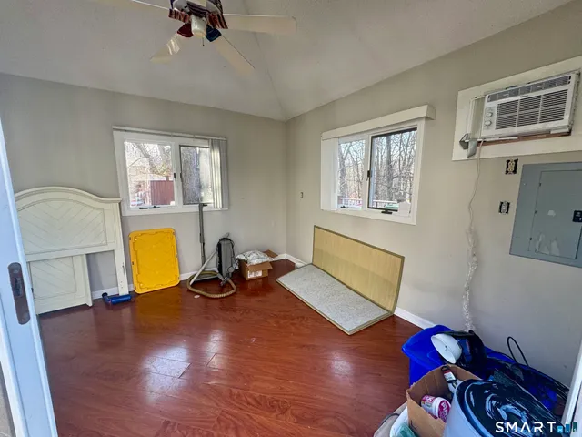 a living room with furniture and a table