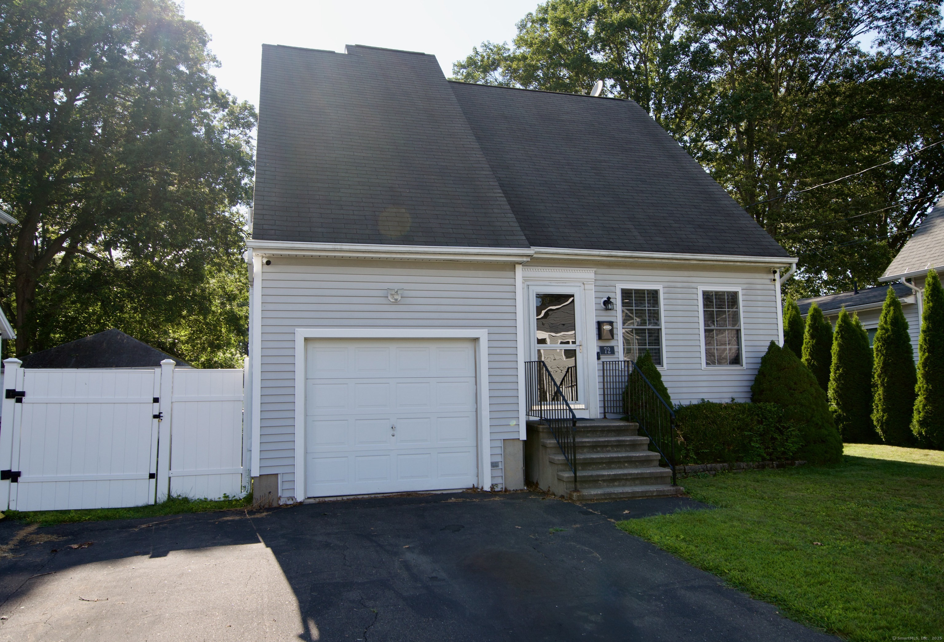 a house view with a garden space