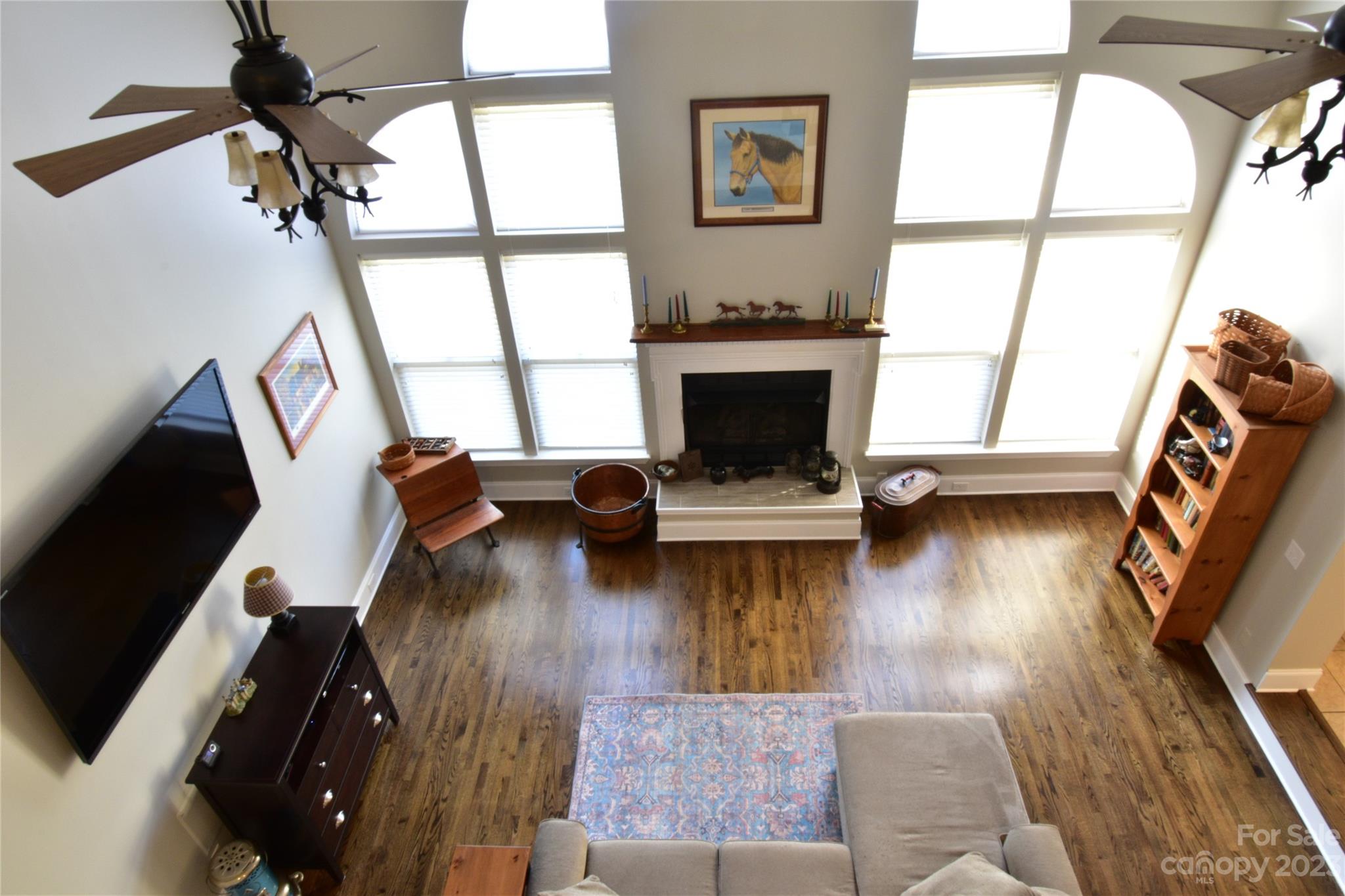 6100 Rehobeth Road Waxhaw, NC 28173 - Photo 12 of 37 a living room with furniture and a fireplace