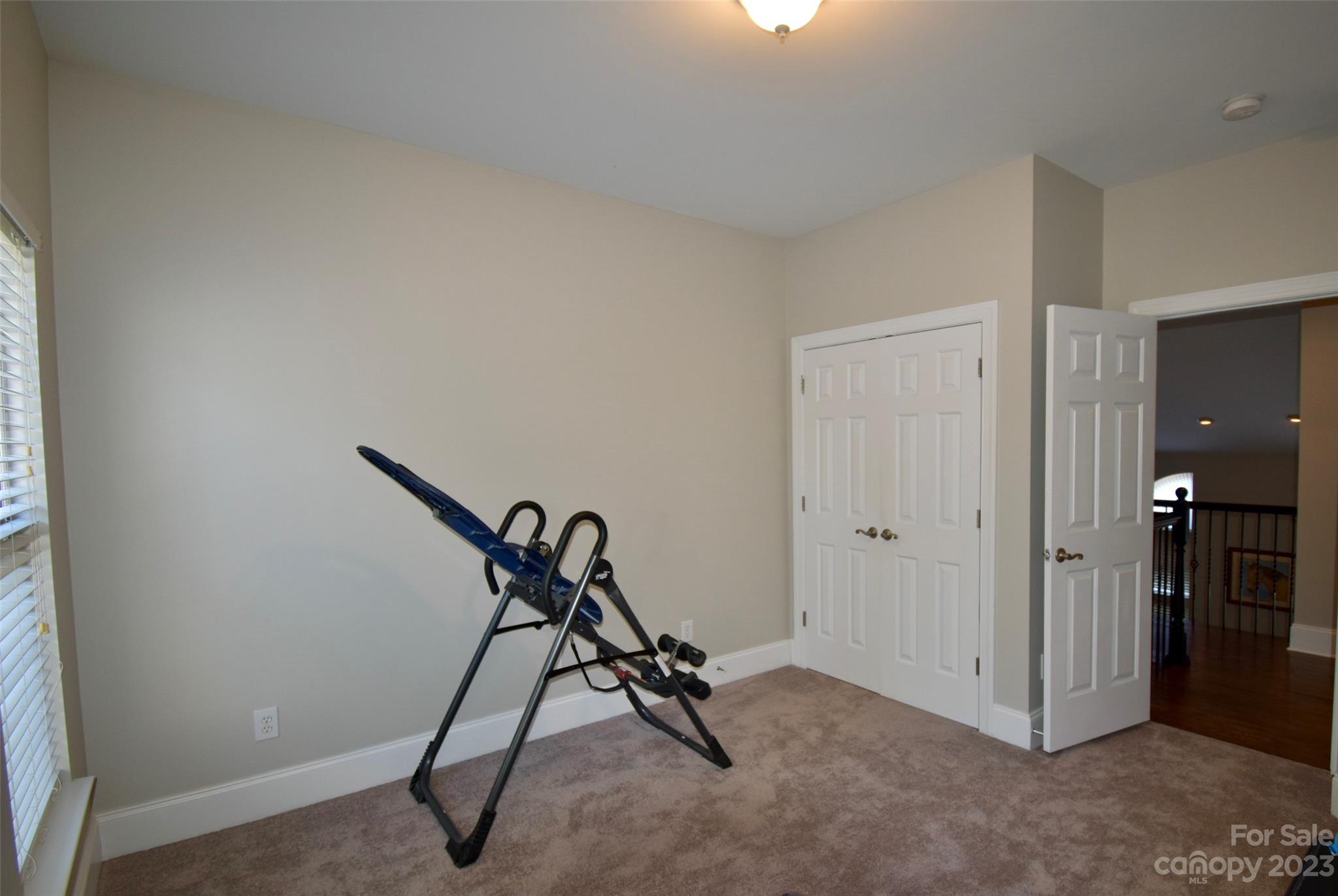 6100 Rehobeth Road Waxhaw, NC 28173 - Photo 28 of 37 a view of a room with gym equipment
