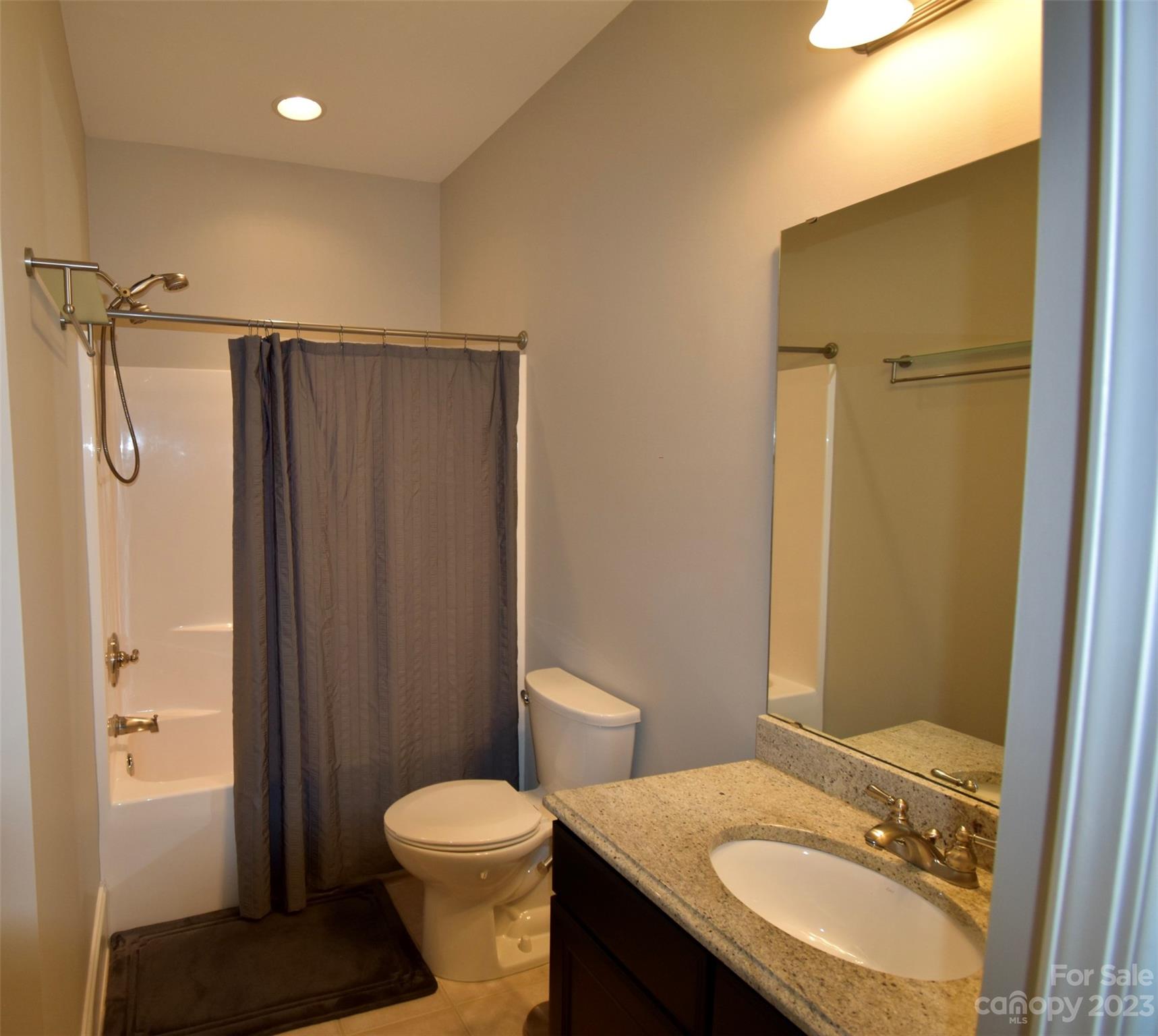 6100 Rehobeth Road Waxhaw, NC 28173 - Photo 29 of 37 a bathroom with a sink toilet and shower