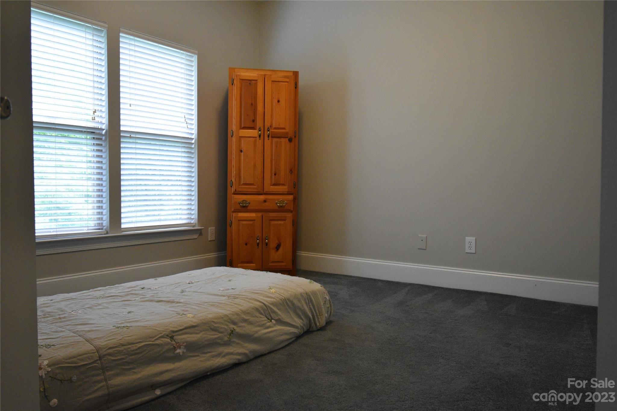 6100 Rehobeth Road Waxhaw, NC 28173 - Photo 30 of 37 a bedroom with a bed and a window