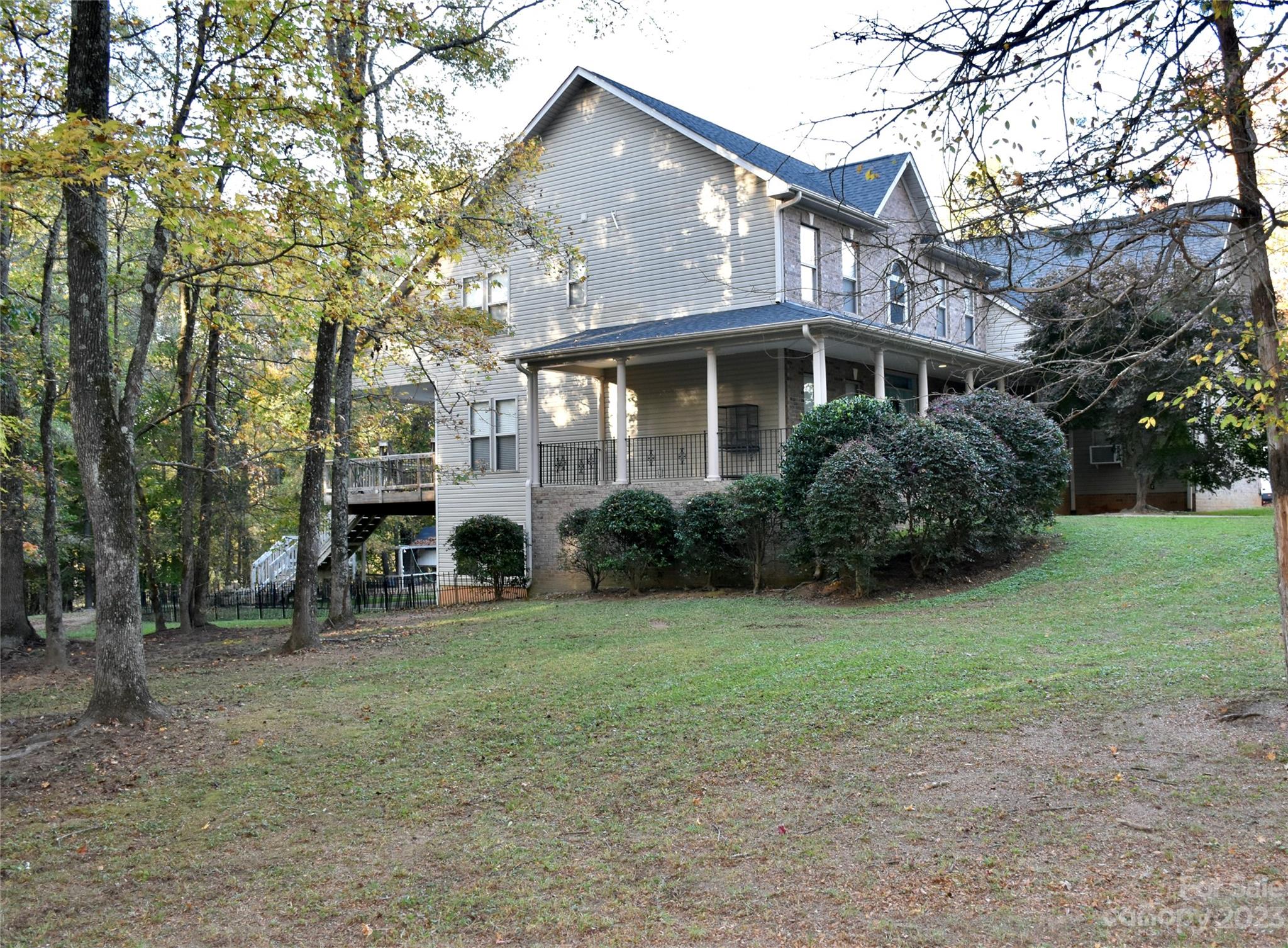 6100 Rehobeth Road Waxhaw, NC 28173 - Photo 34 of 37 a front view of a house with a garden