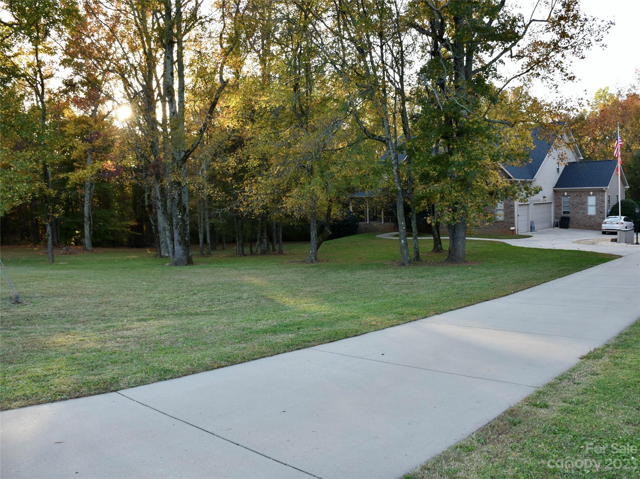 6100 Rehobeth Road Waxhaw, NC 28173 - Photo 35 of 37 a view of a park with large trees