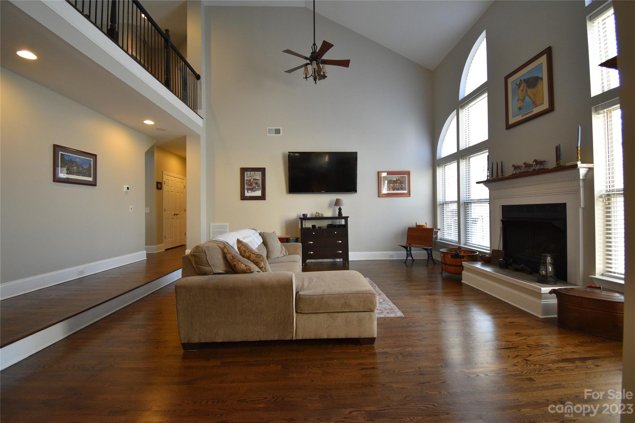 6100 Rehobeth Road Waxhaw, NC 28173 - Photo 10 of 37 a living room with fireplace furniture and a flat screen tv