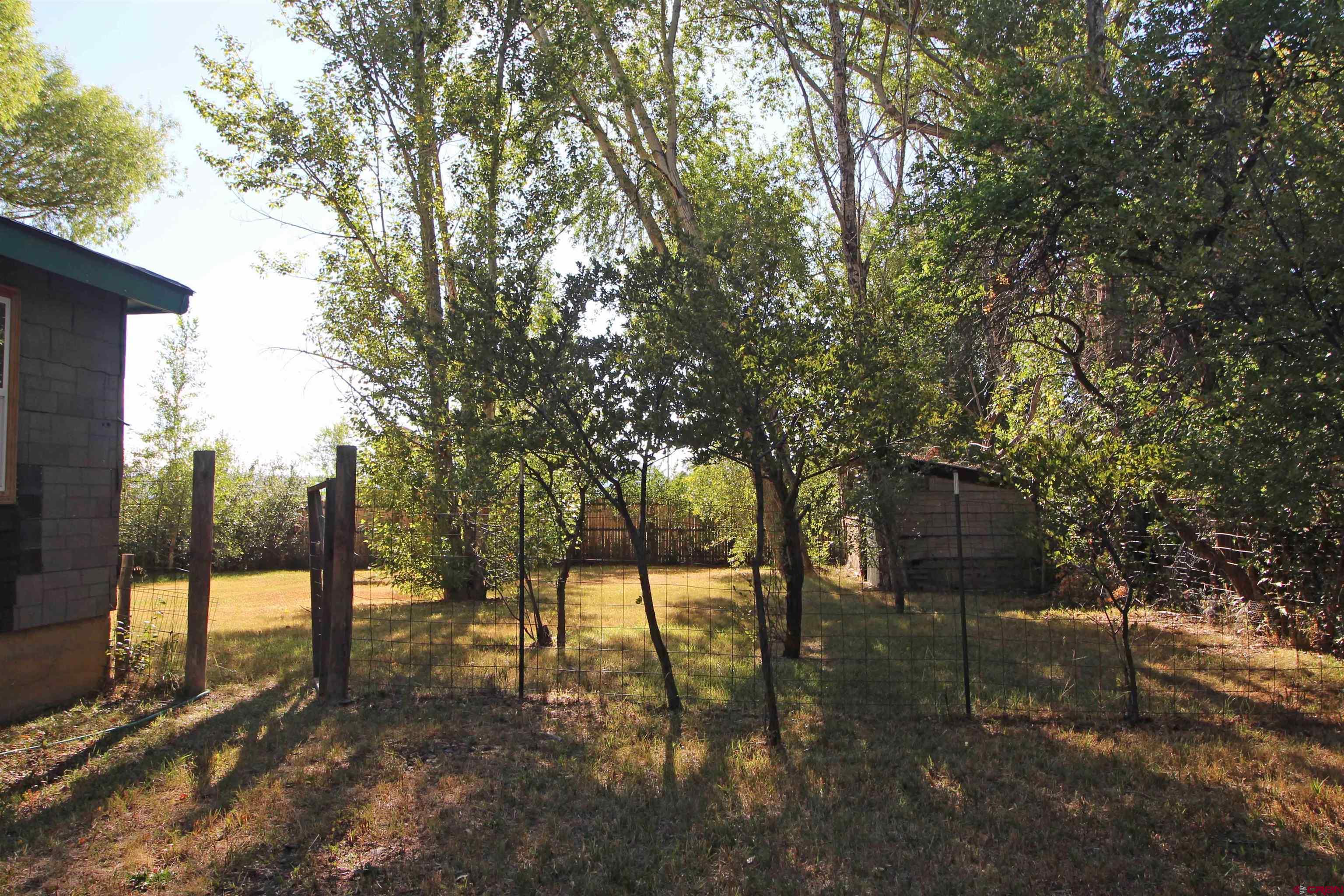 304 South Walnut Street Mancos, CO 81328 - Photo 19 of 31 a view of outdoor space with seating area