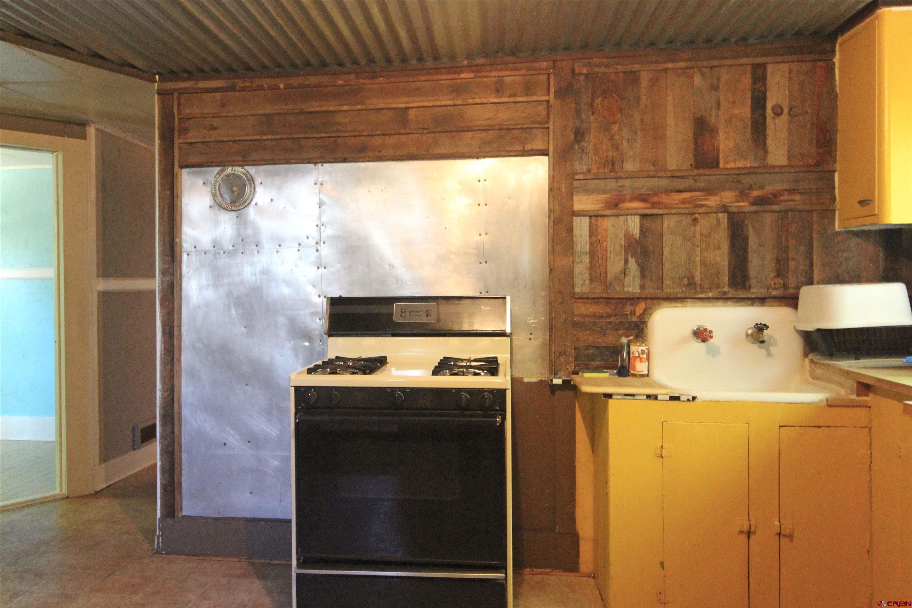 304 South Walnut Street Mancos, CO 81328 - Photo 8 of 31 a utility room with dryer and washer