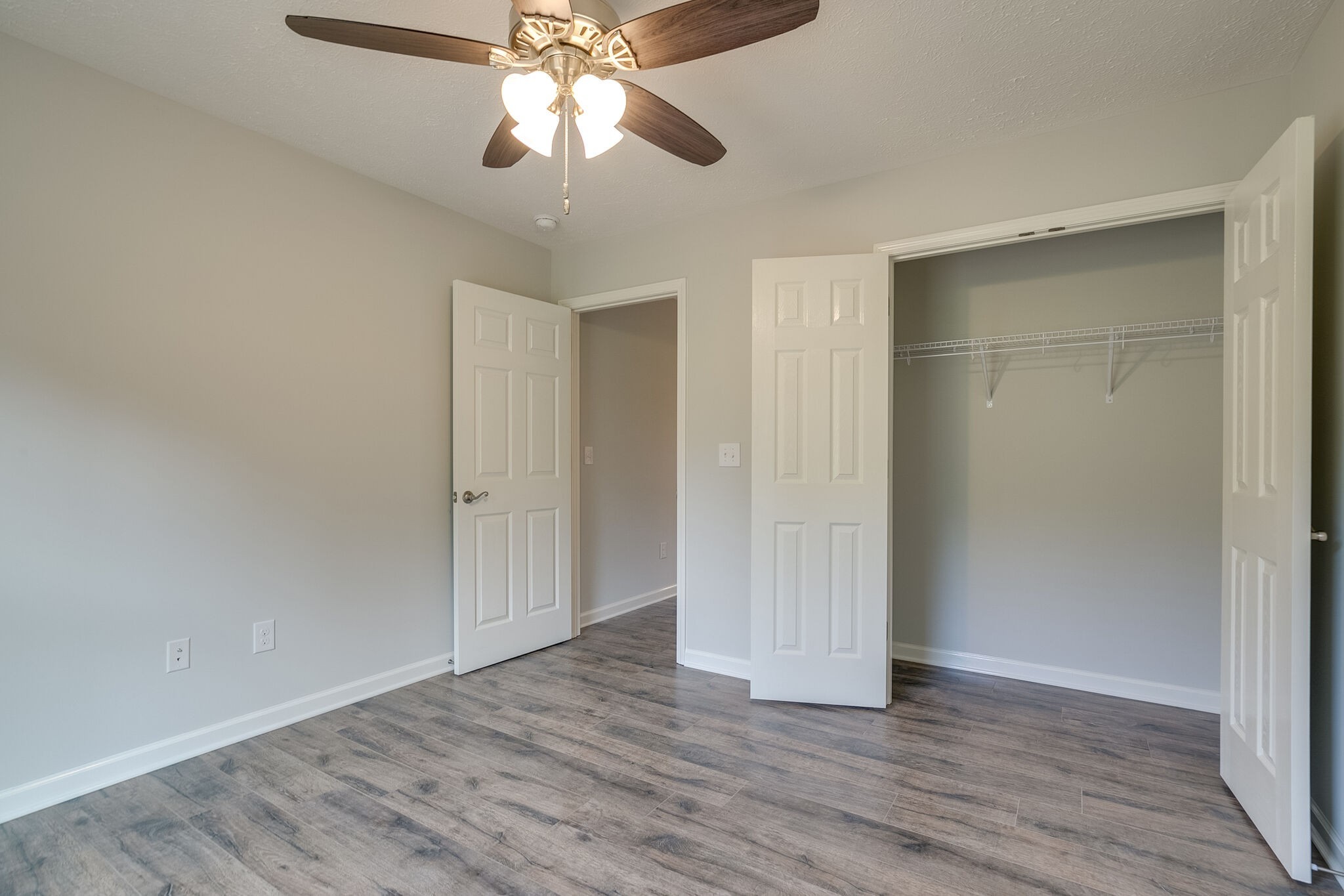 713 Jarrell Road Manchester, TN 37355 - Photo 14 of 25 a view of an empty room with wooden floor
