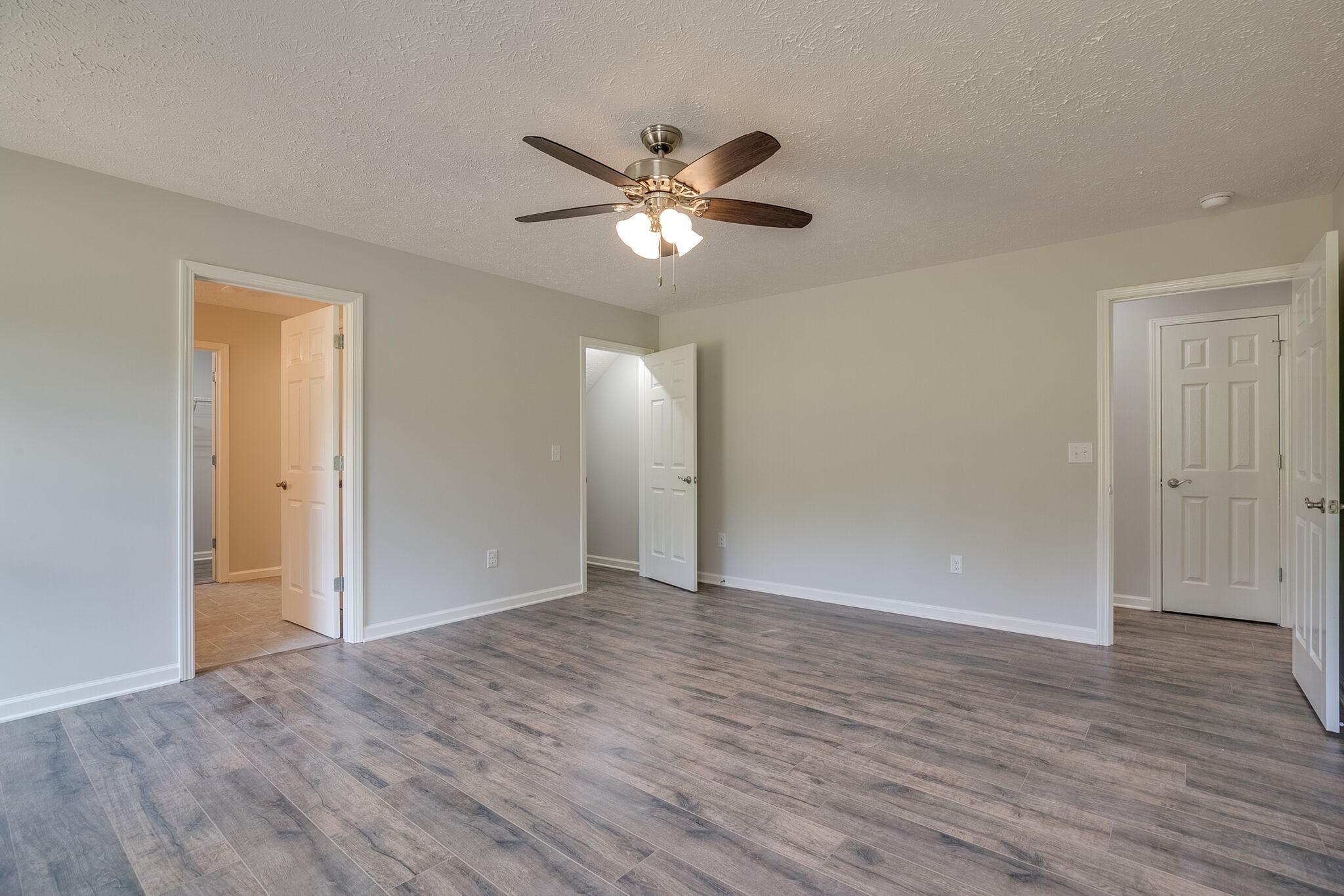 713 Jarrell Road Manchester, TN 37355 - Photo 16 of 25 a view of an empty room with wooden floor