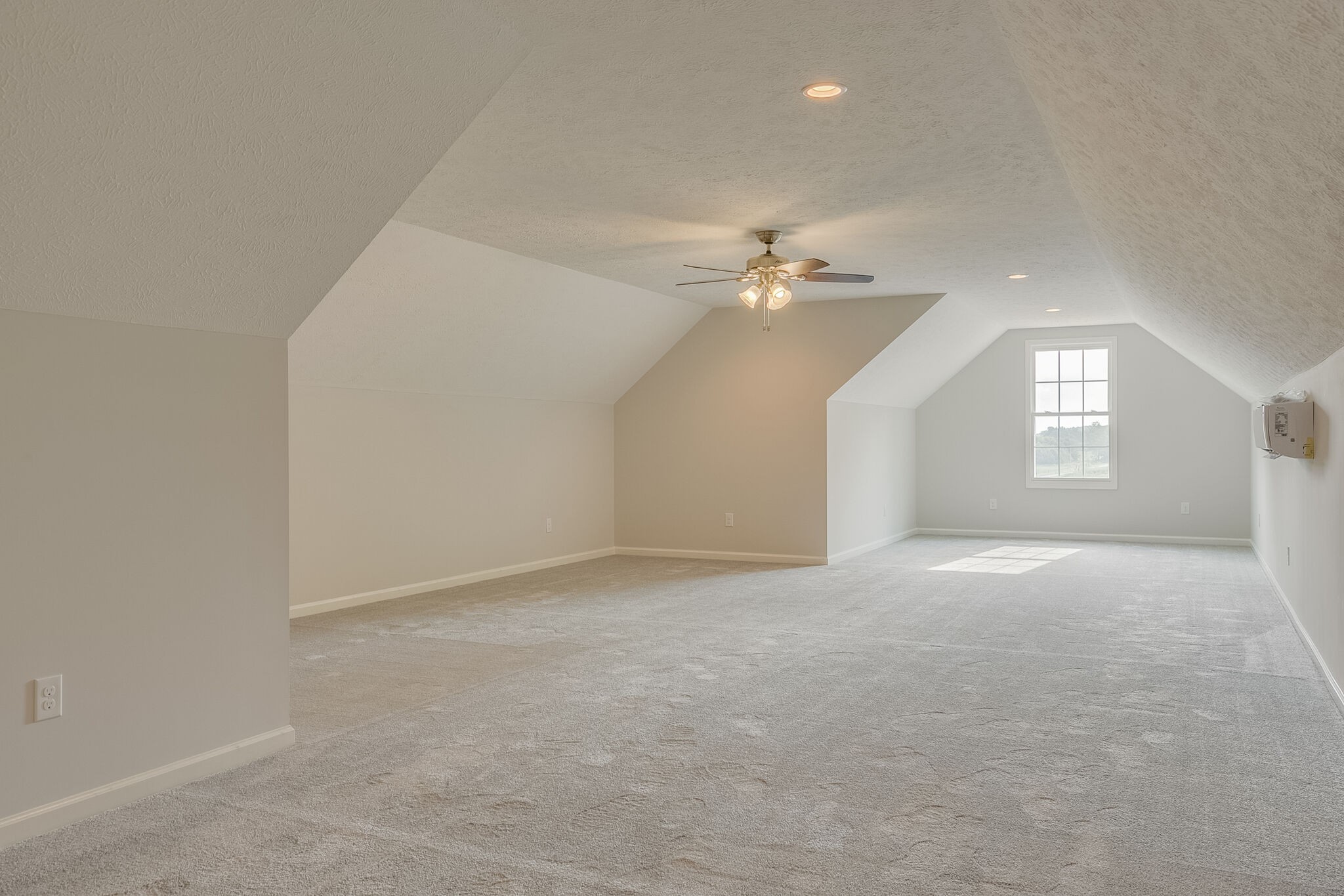 713 Jarrell Road Manchester, TN 37355 - Photo 21 of 25 an empty room with windows and chandelier fan