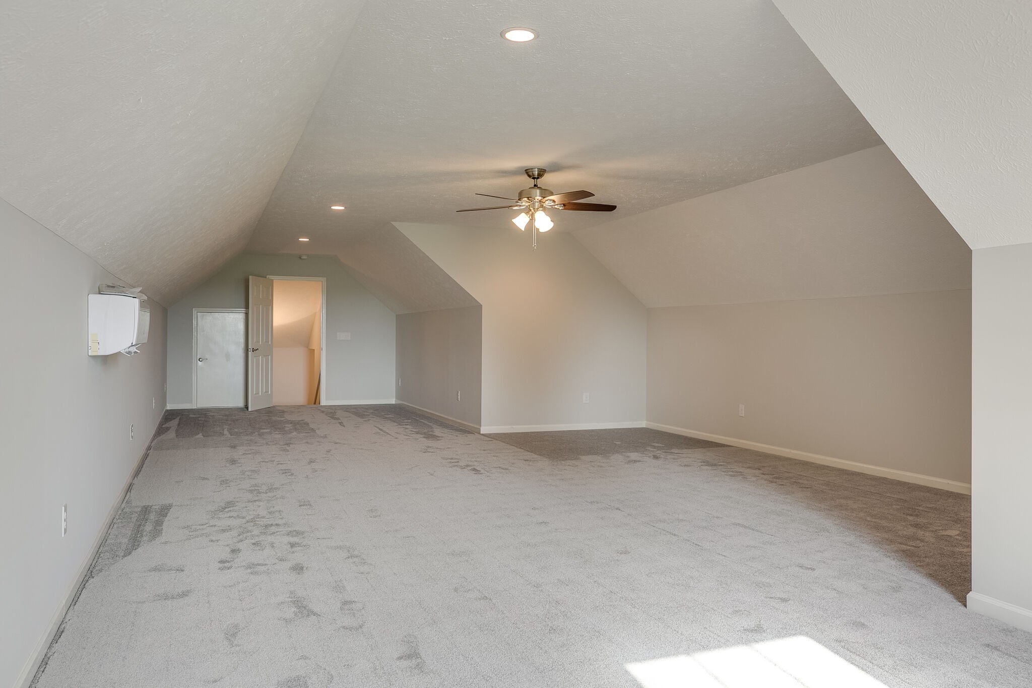 713 Jarrell Road Manchester, TN 37355 - Photo 22 of 25 an empty room with a ceiling fan and hardwood floor