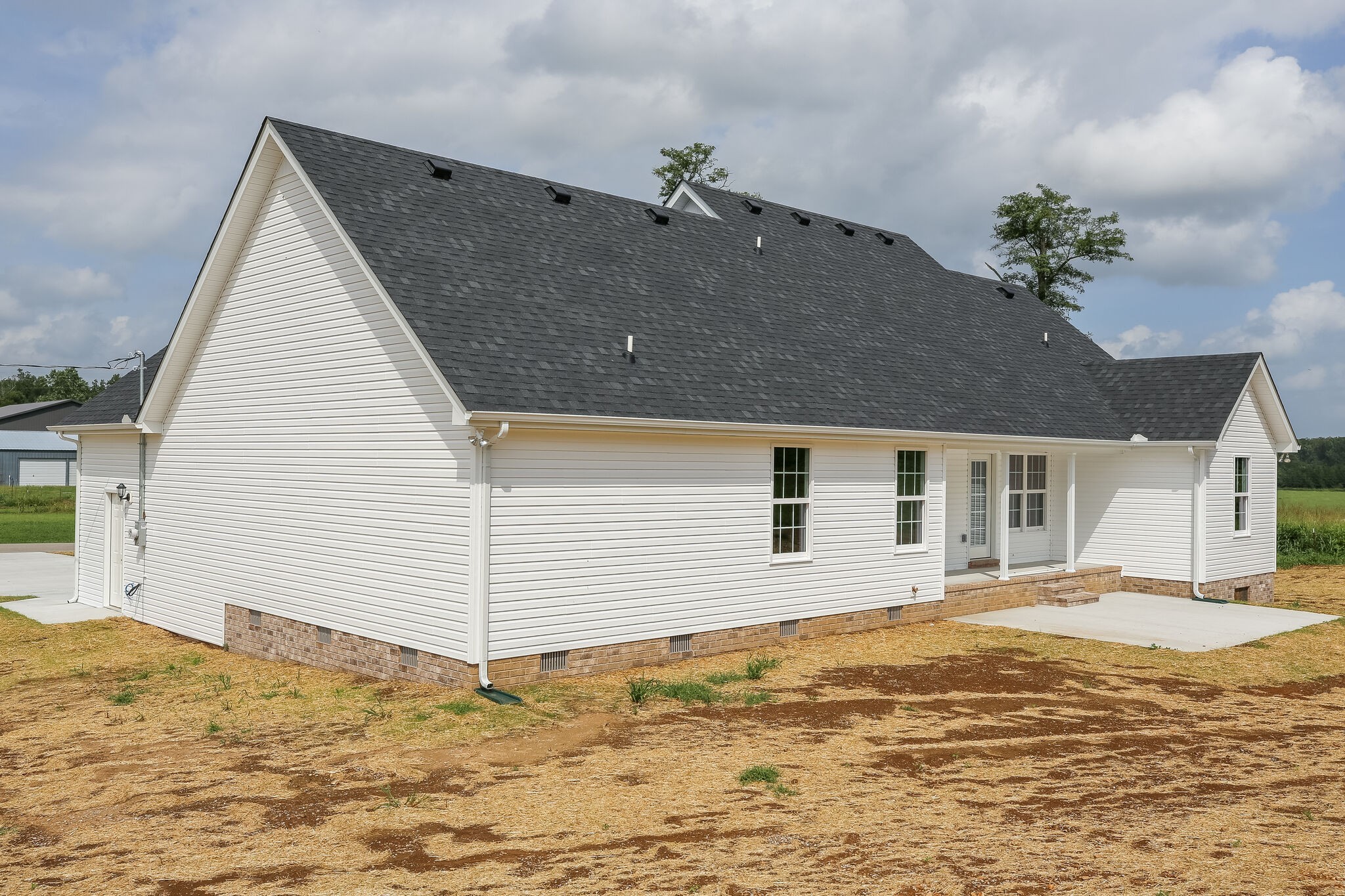 713 Jarrell Road Manchester, TN 37355 - Photo 25 of 25 a view of a house with a backyard