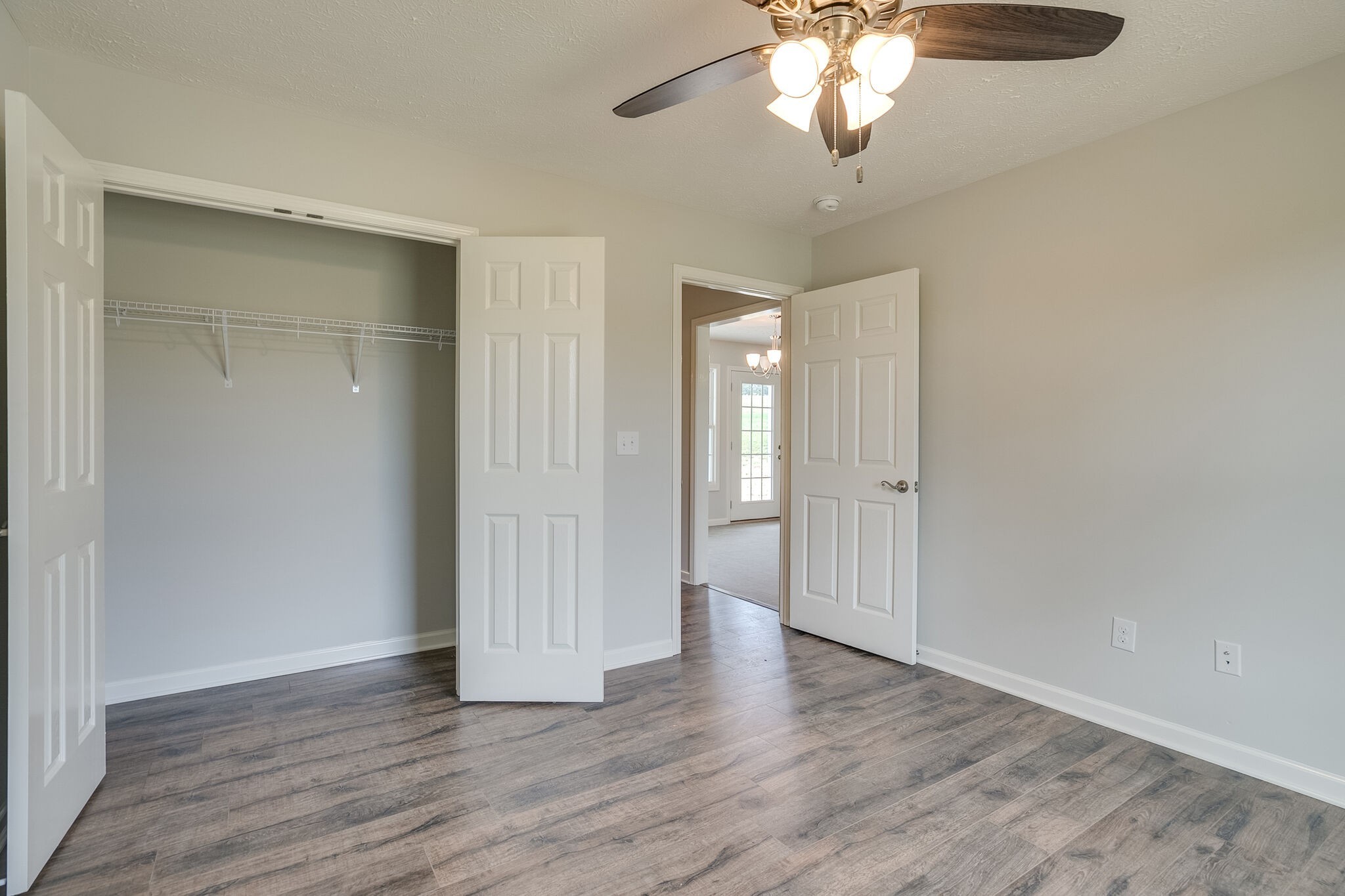 713 Jarrell Road Manchester, TN 37355 - Photo 10 of 25 wooden floor in an empty room with a window