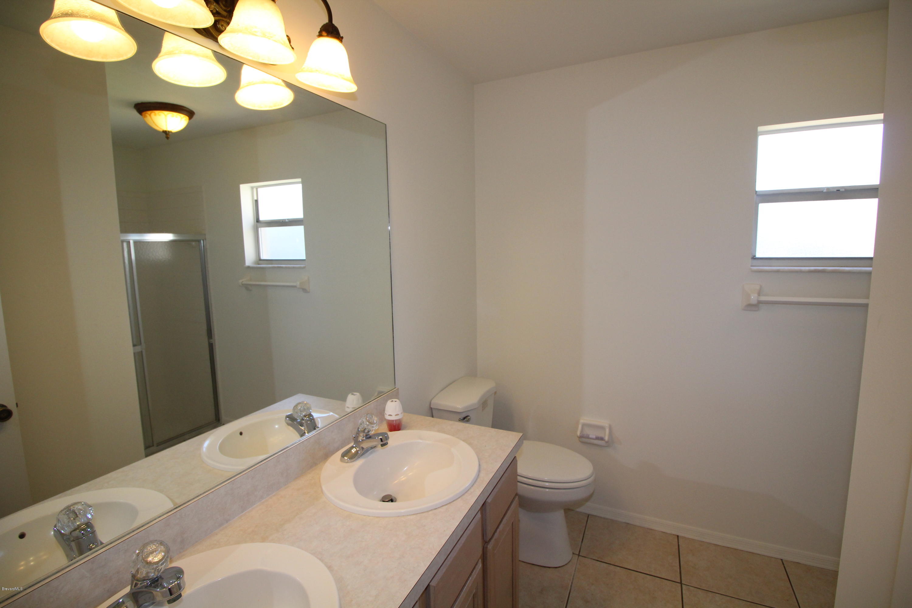 1940 Blue Ridge Avenue Melbourne, FL 32935 - Photo 10 of 12 master bathroom