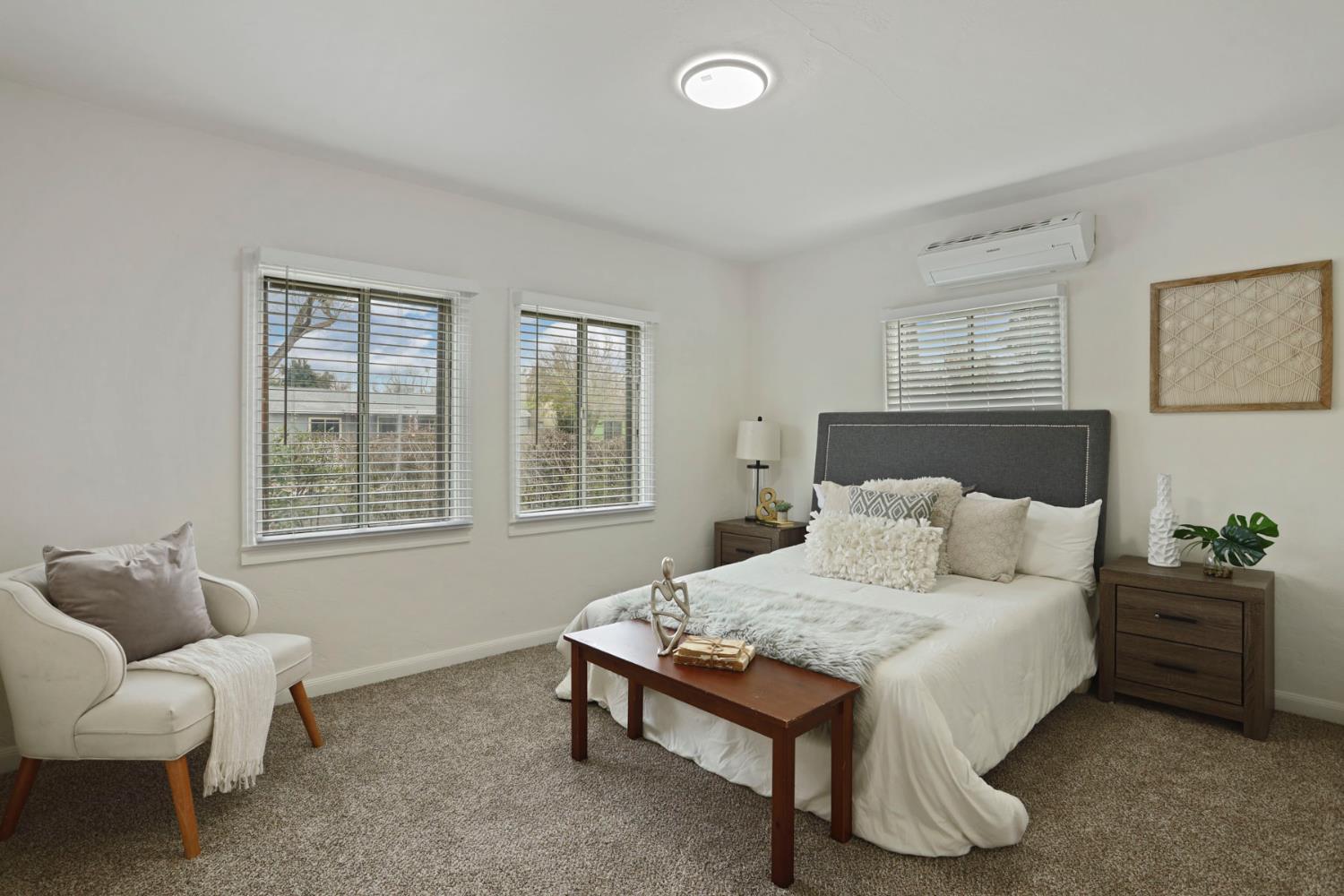 1436 Teresa Street Modesto, CA 95350 - Photo 24 of 32 a bedroom with a bed and a couch