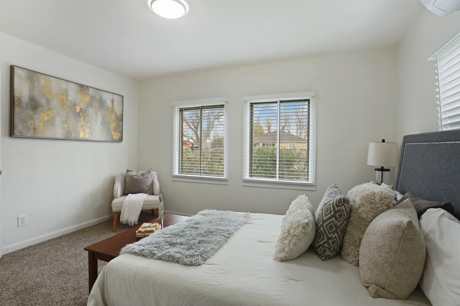 1436 Teresa Street Modesto, CA 95350 - Photo 25 of 32 a bedroom with a bed and window