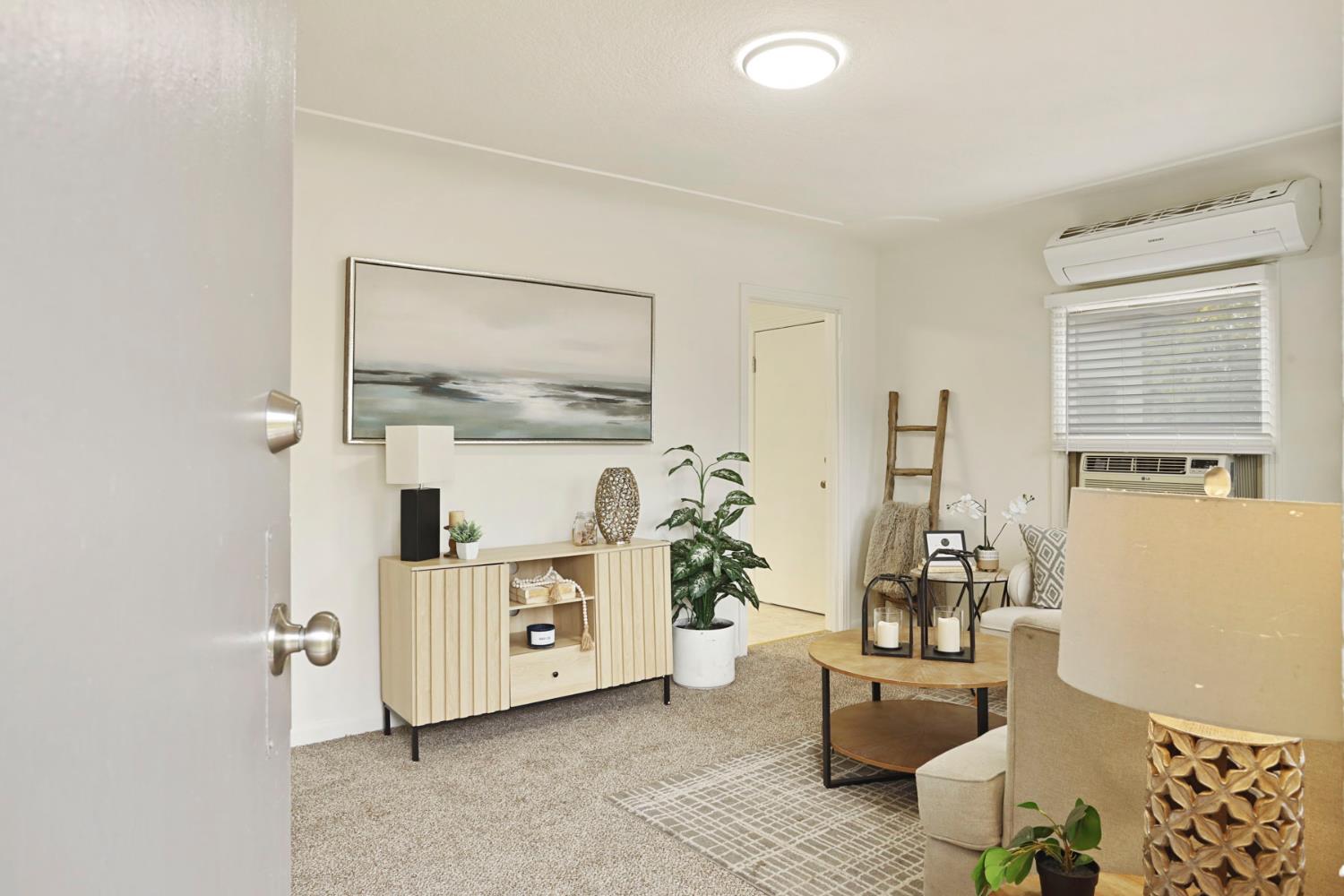 1436 Teresa Street Modesto, CA 95350 - Photo 8 of 32 a living room with furniture and a table