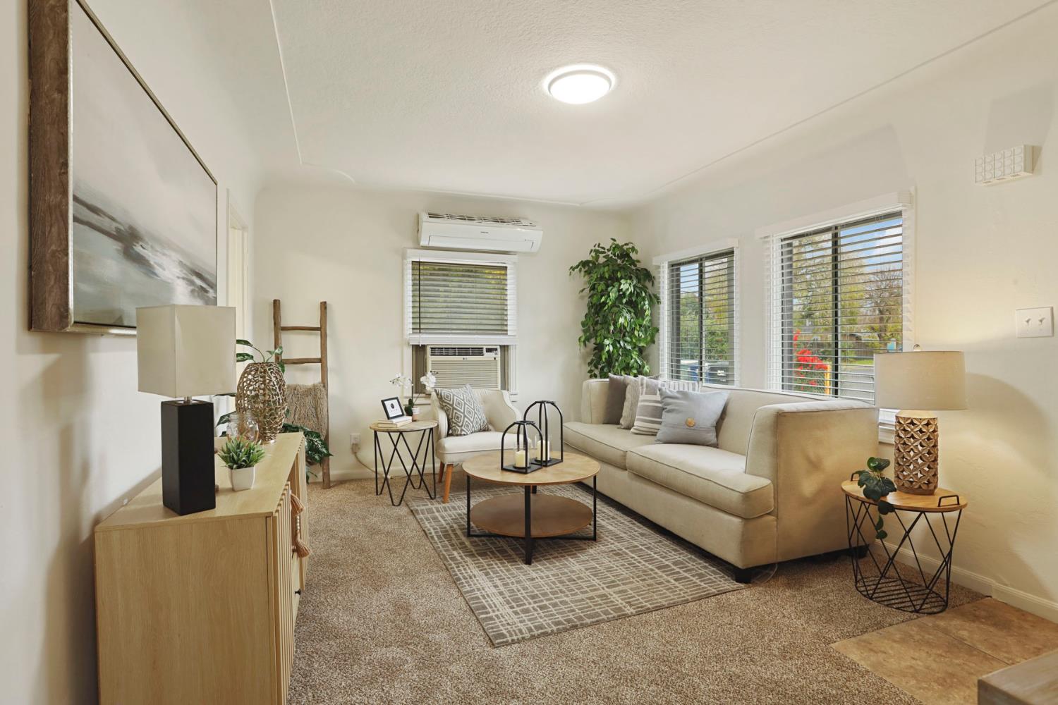 1436 Teresa Street Modesto, CA 95350 - Photo 10 of 32 a living room with furniture and a large window