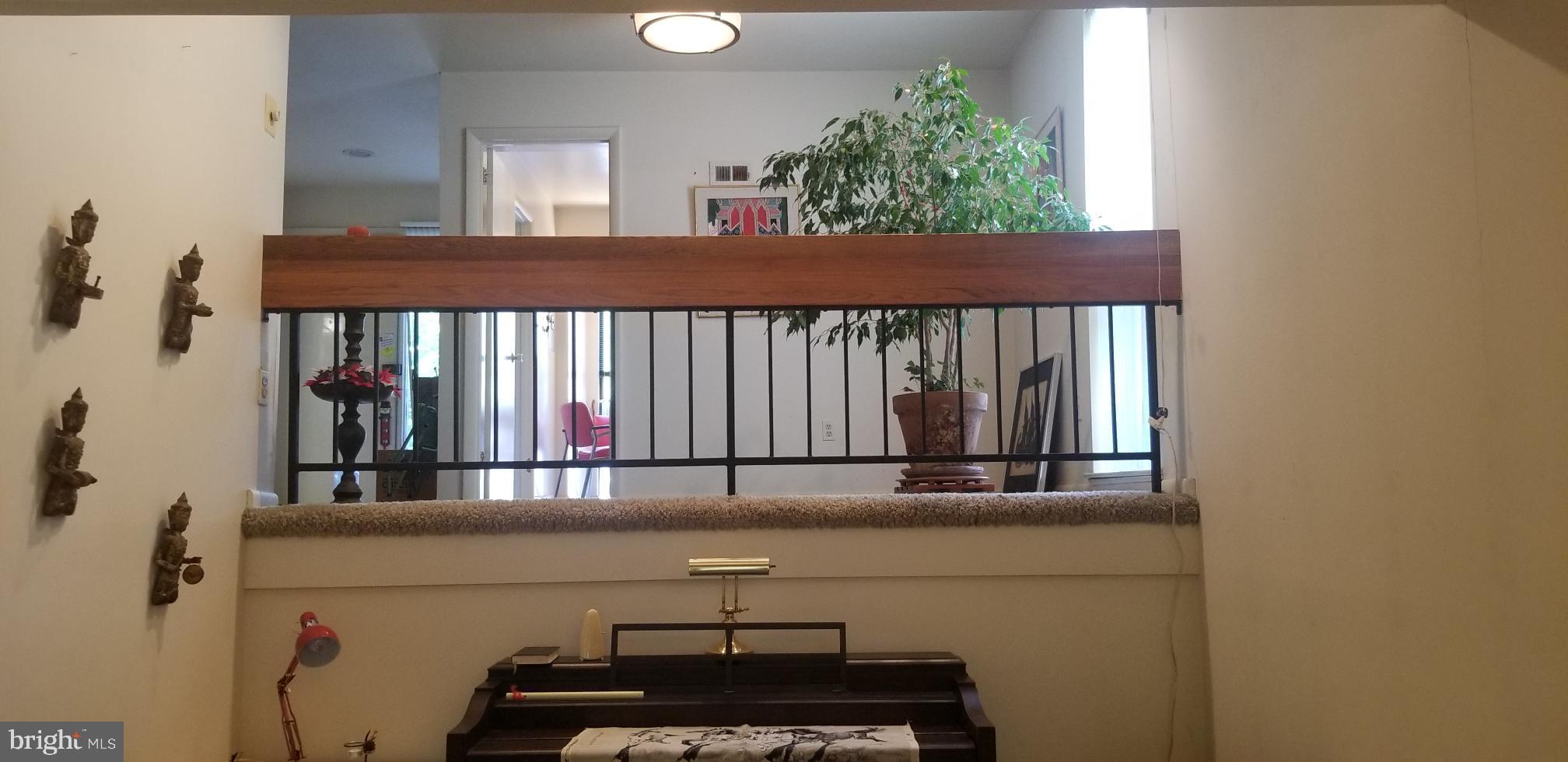 11671 Newbridge Court Reston, VA 20191 - Photo 21 of 36 Living Room up to Dining Room