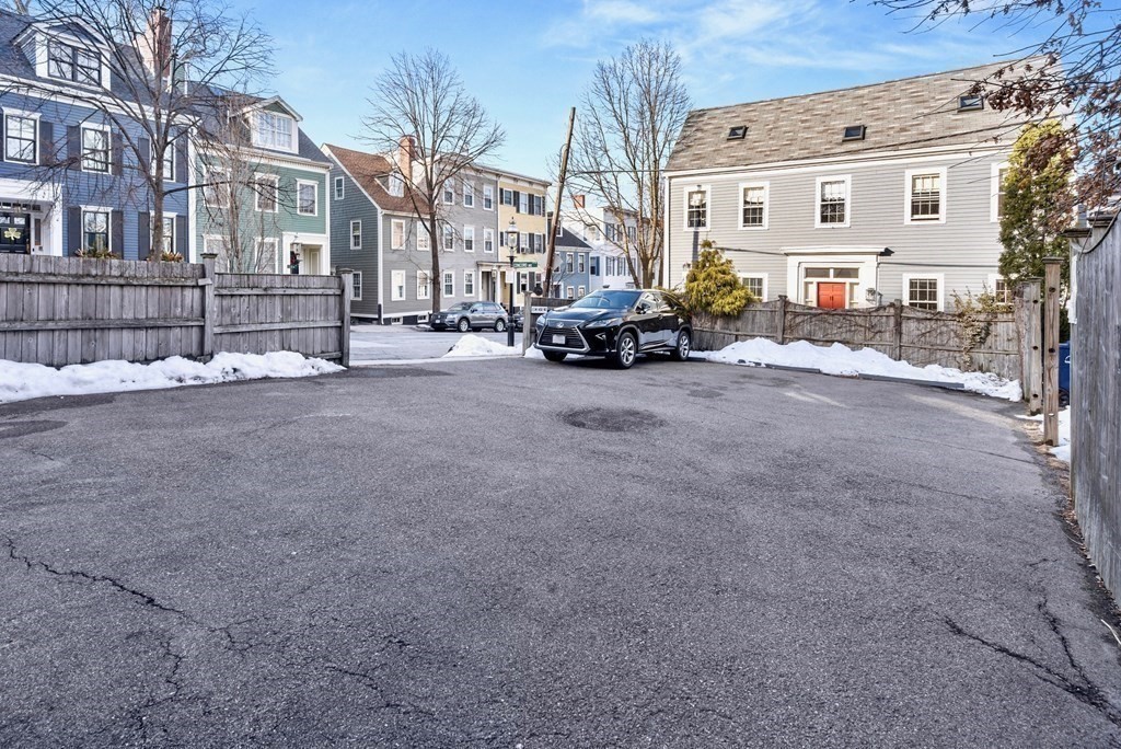 27 Monument Square, Unit 2 Boston, MA 02129 - Photo 14 of 17 a view of a house with a cars park