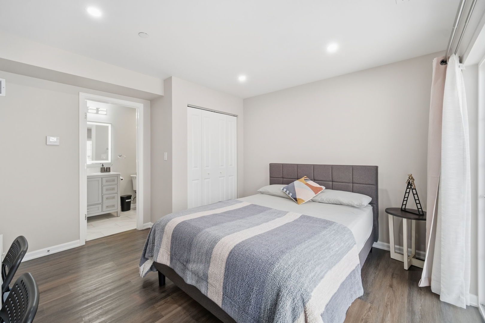 7214 Farmstead Lane Hanover Park, IL 60133 - Photo 16 of 30 a bedroom with a bed and wooden floor